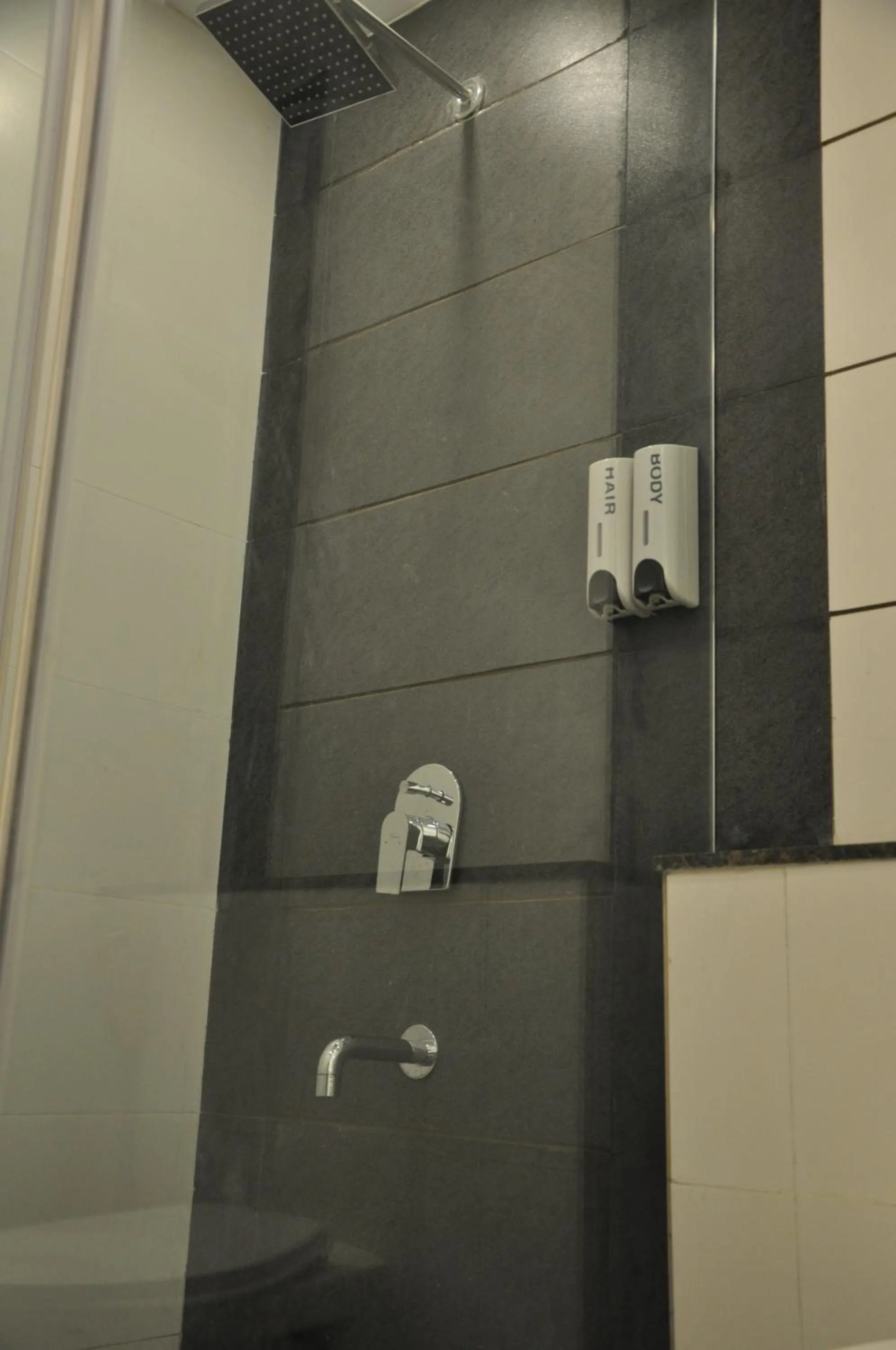 Bathroom in Pride Biznotel Manjusar Vadodara Near Sokhda Lake