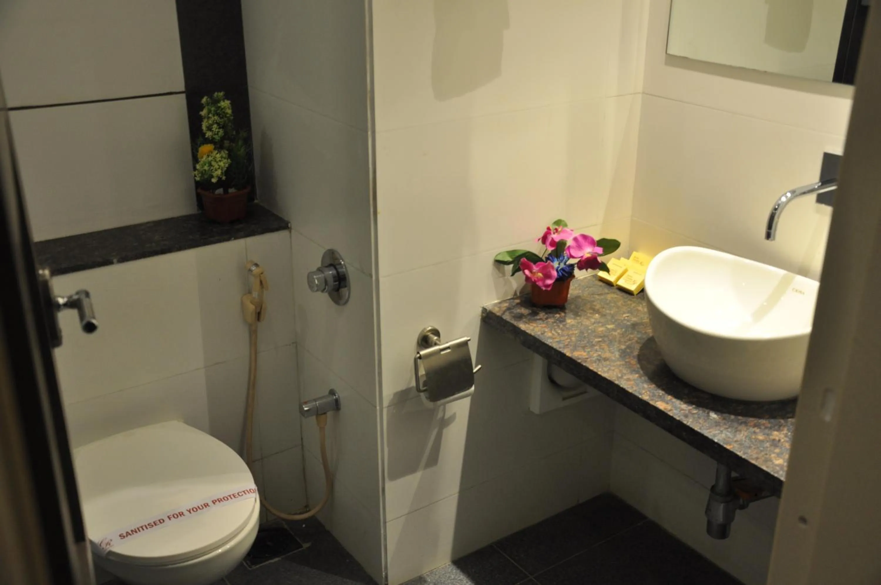 Bathroom in Pride Biznotel Manjusar Vadodara Near Sokhda Lake