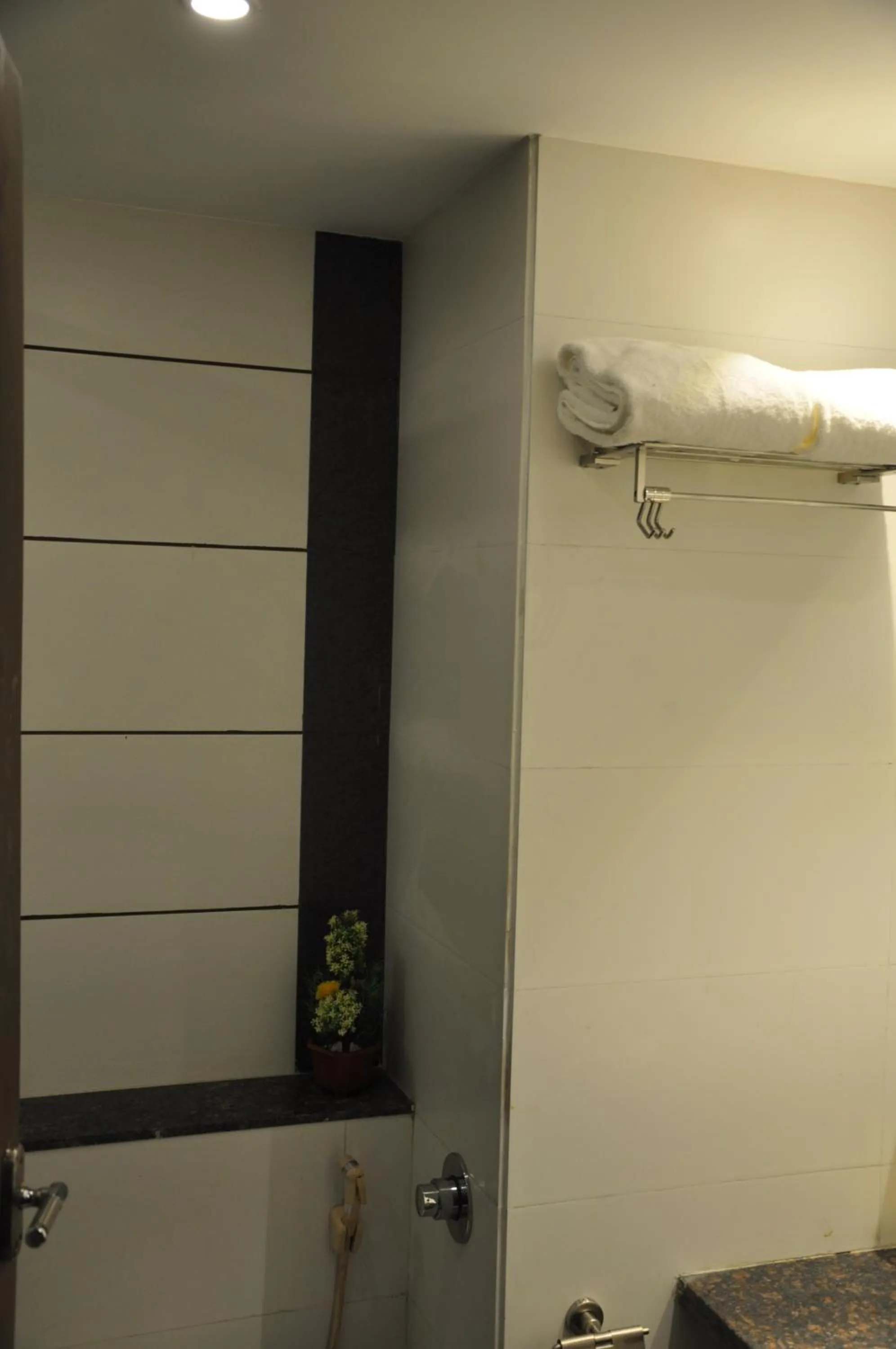 Bathroom in Pride Biznotel Manjusar Vadodara Near Sokhda Lake