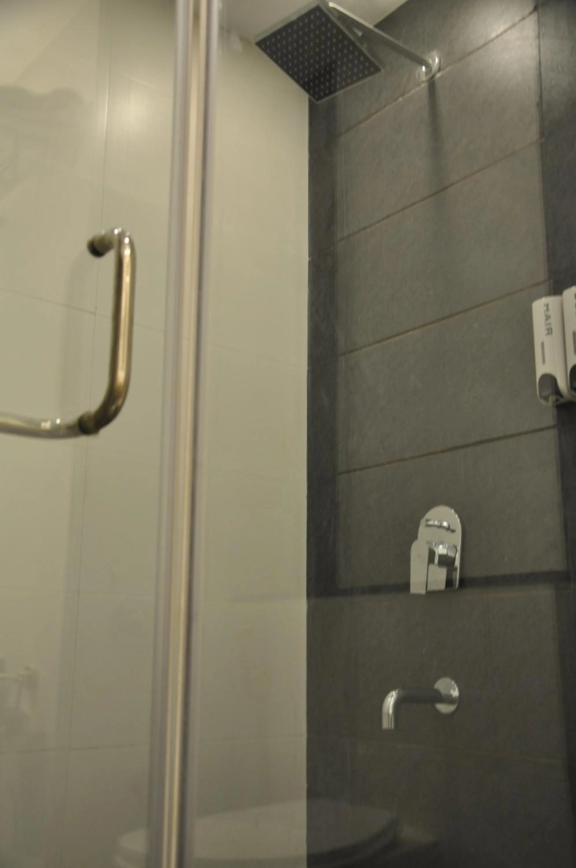 Bathroom in Pride Biznotel Manjusar Vadodara Near Sokhda Lake