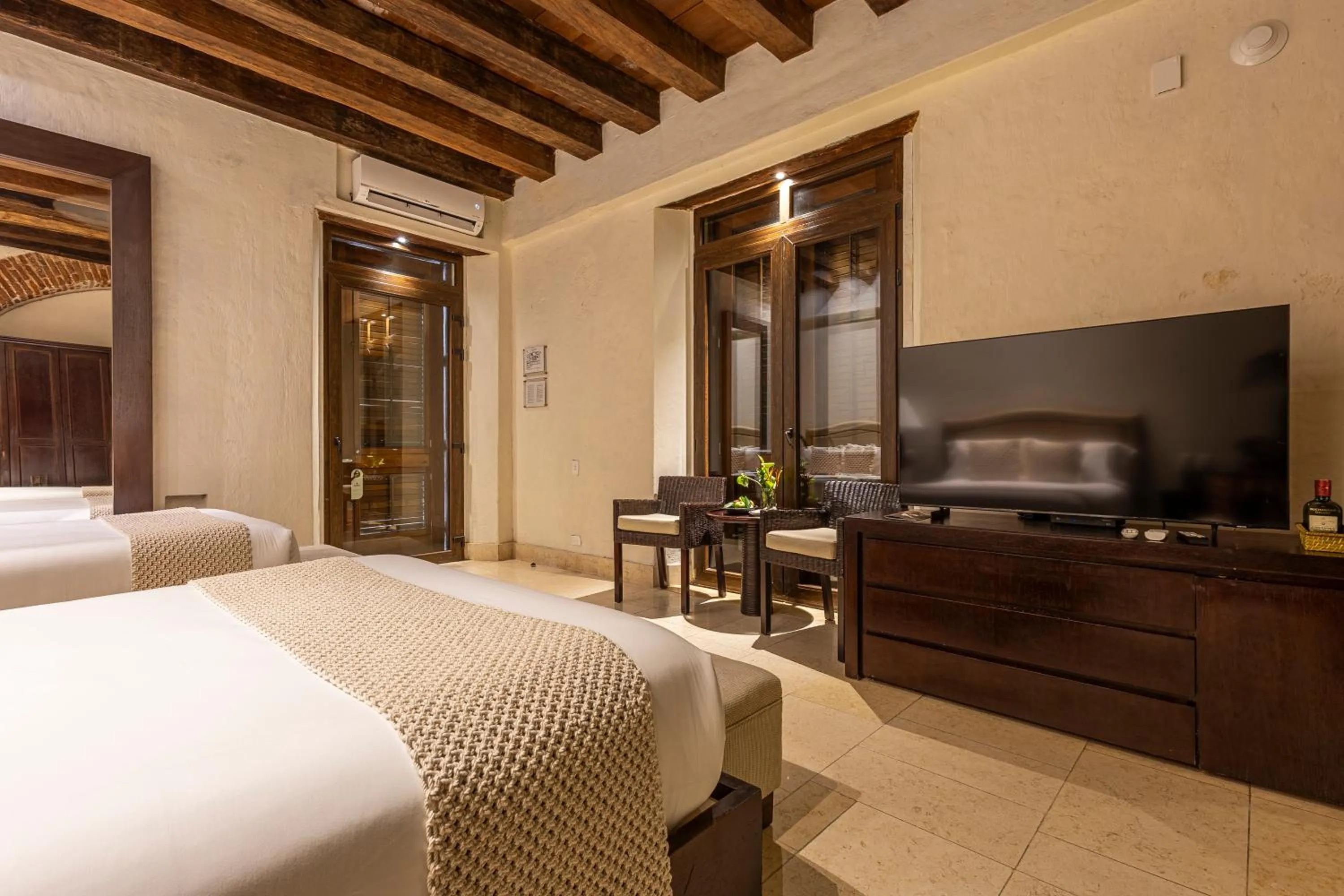 Photo of the whole room, Bed in Ananda Hotel Boutique