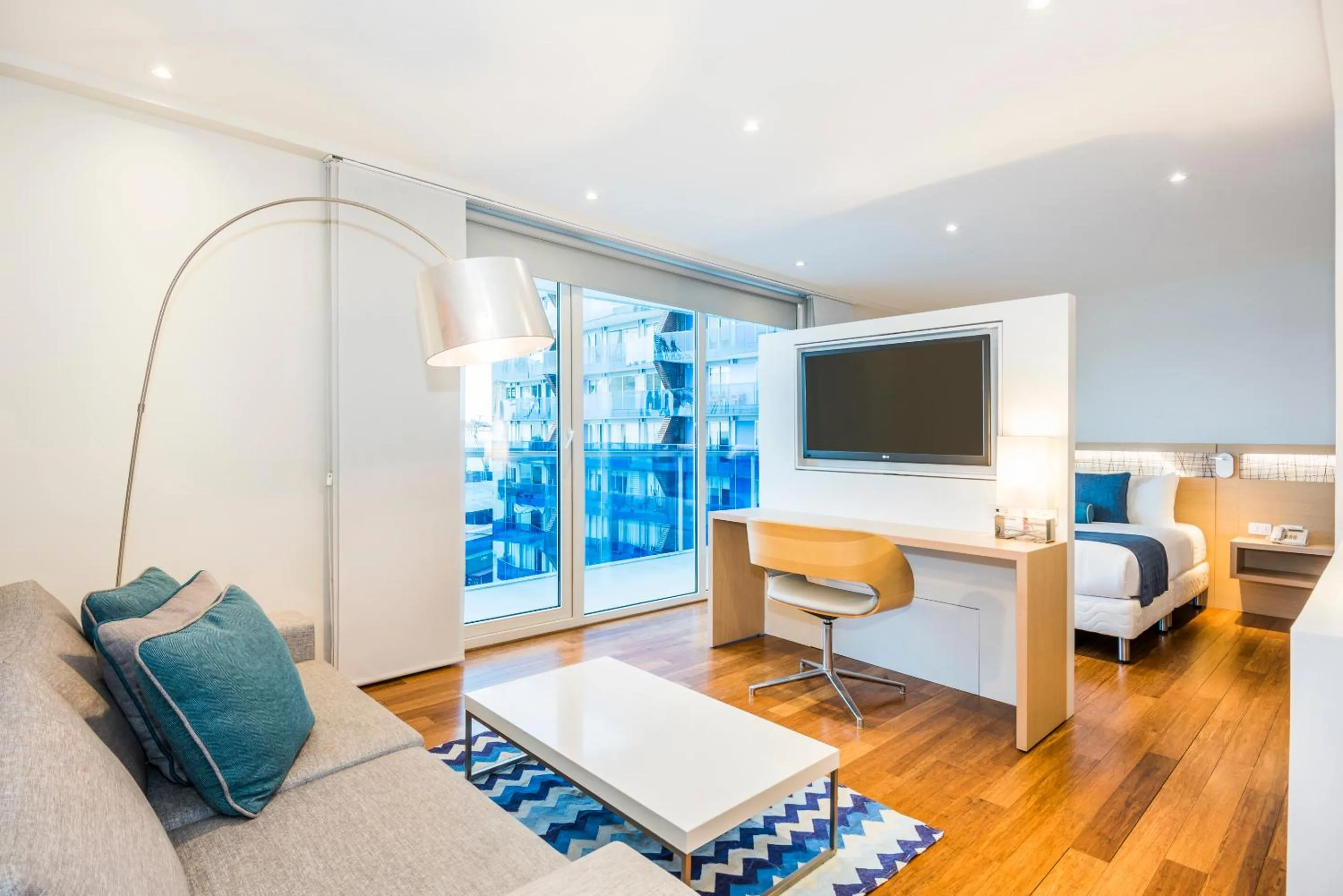 Seating area, Bed in Cosmos Pacifico Hotel