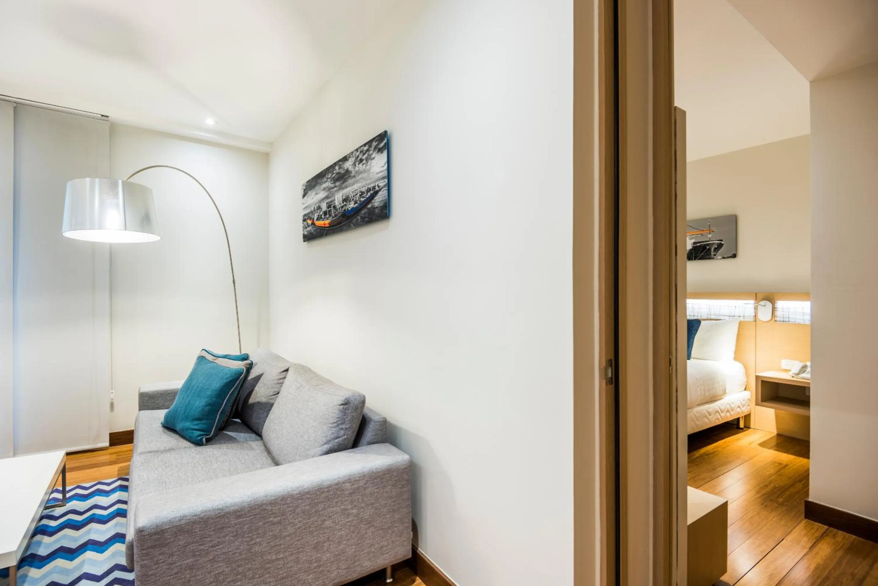 Seating area, Bed in Cosmos Pacifico Hotel