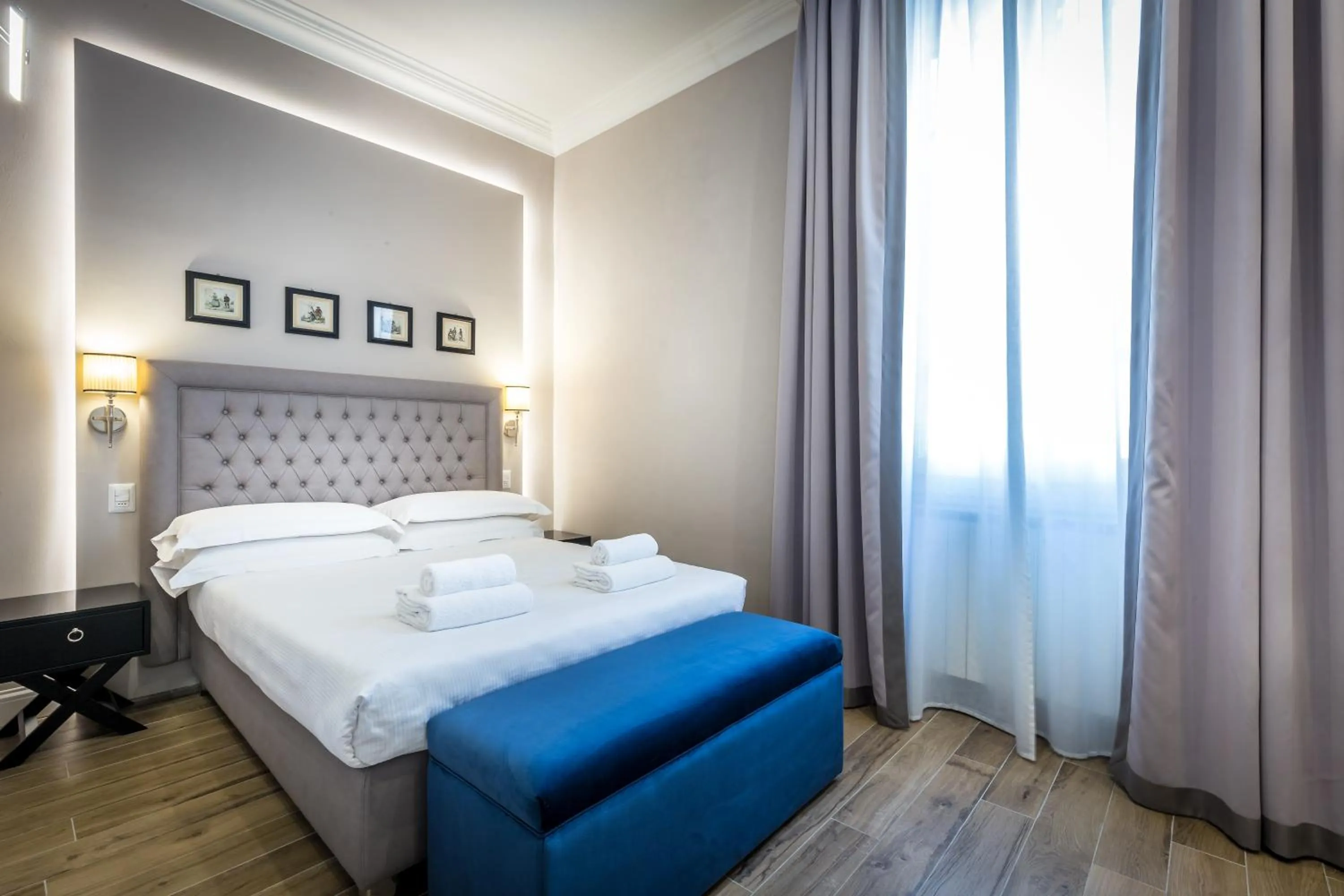 Bed in Hotel Emma Small Luxury Hotel