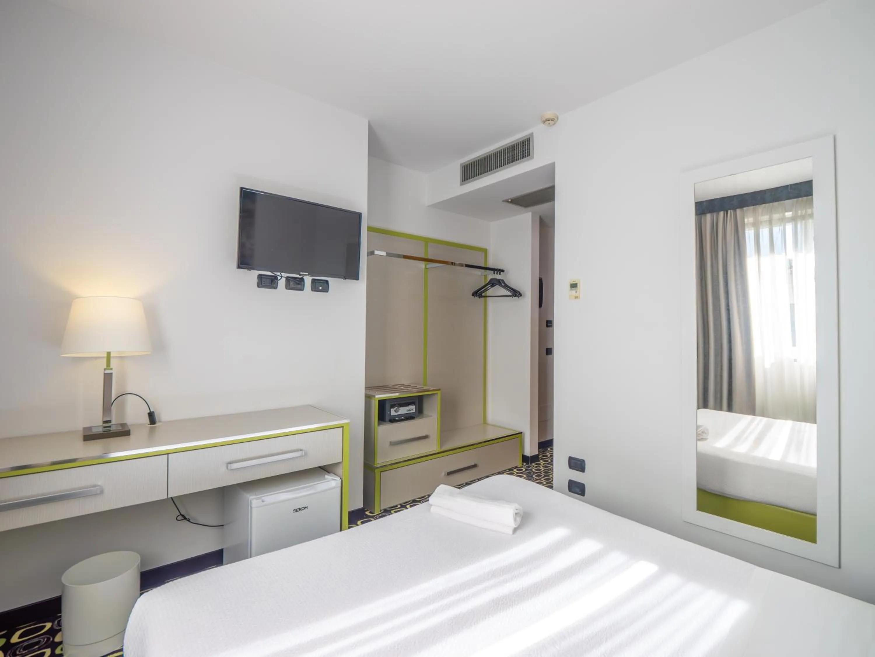 Bed in San Valentino Hotel