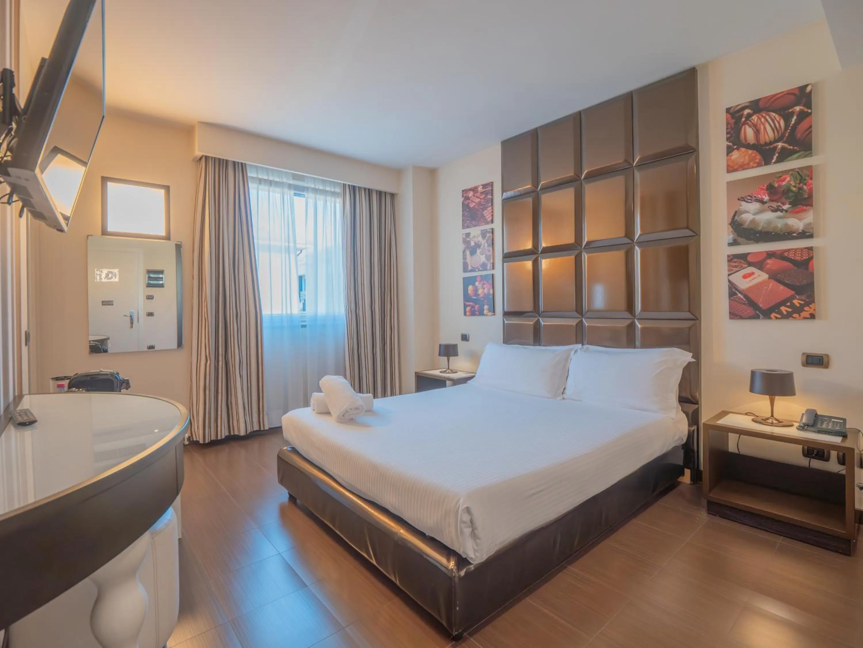 Bed in San Valentino Hotel