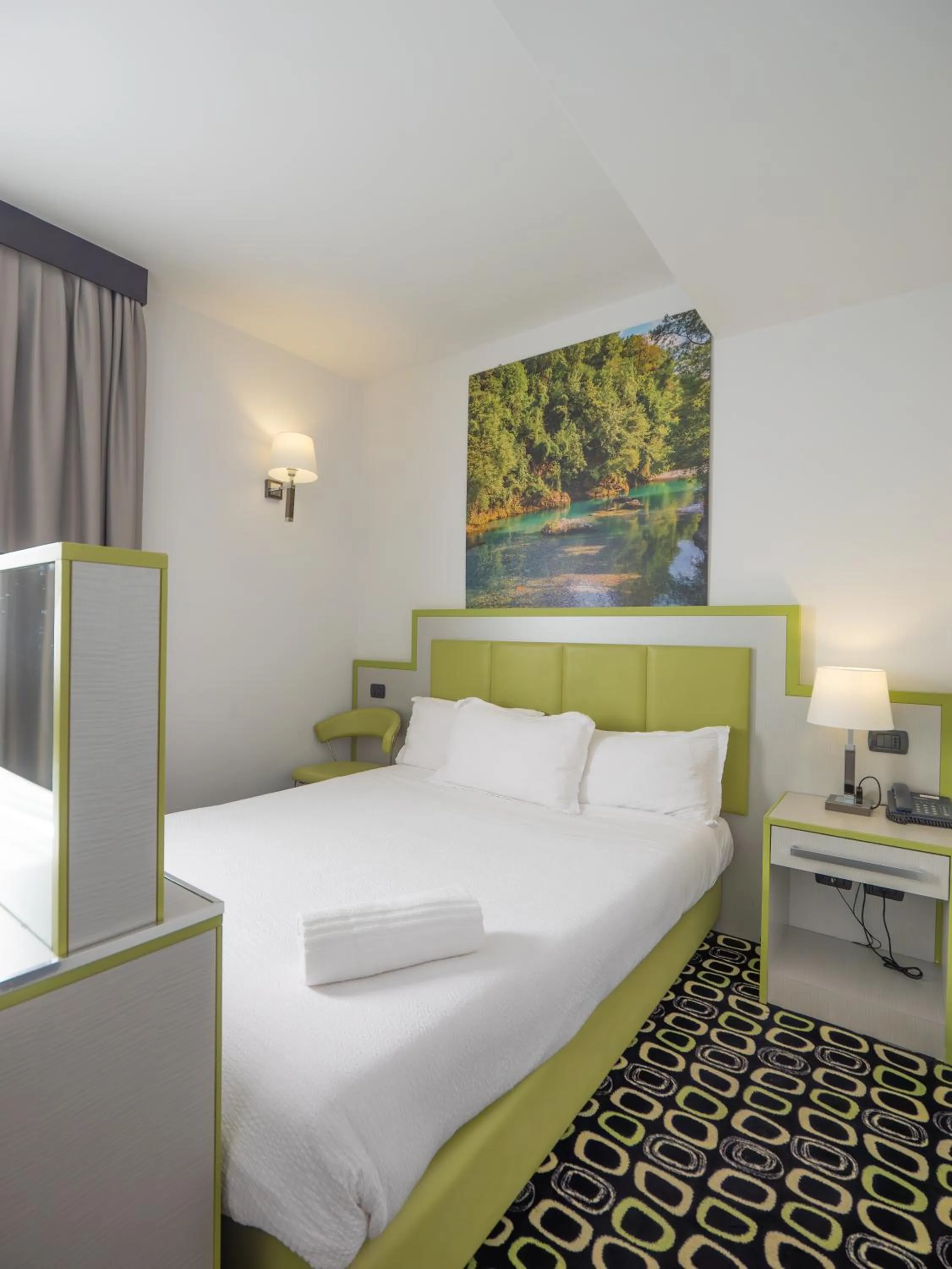 Bed in San Valentino Hotel