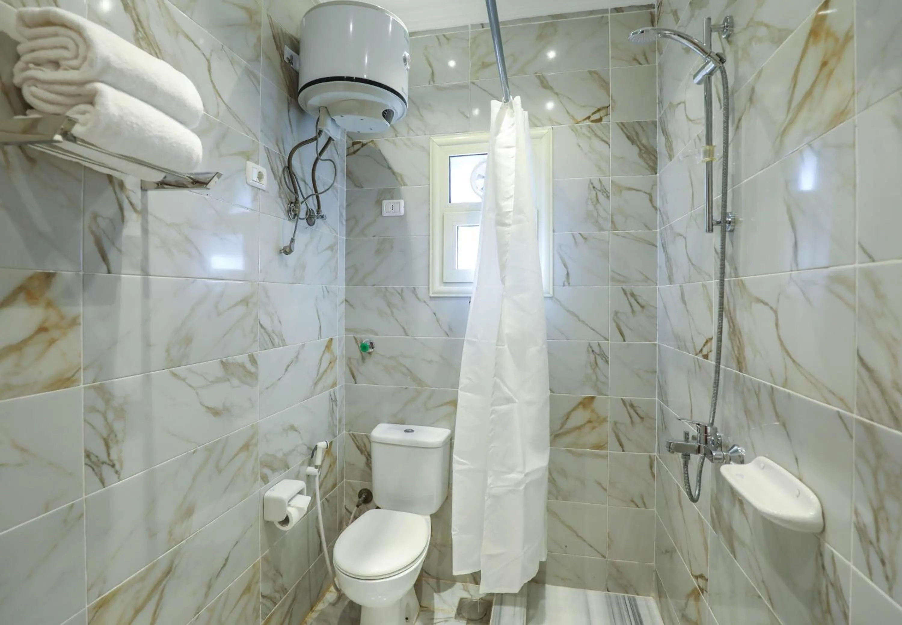 Shower in The Palm Hotel