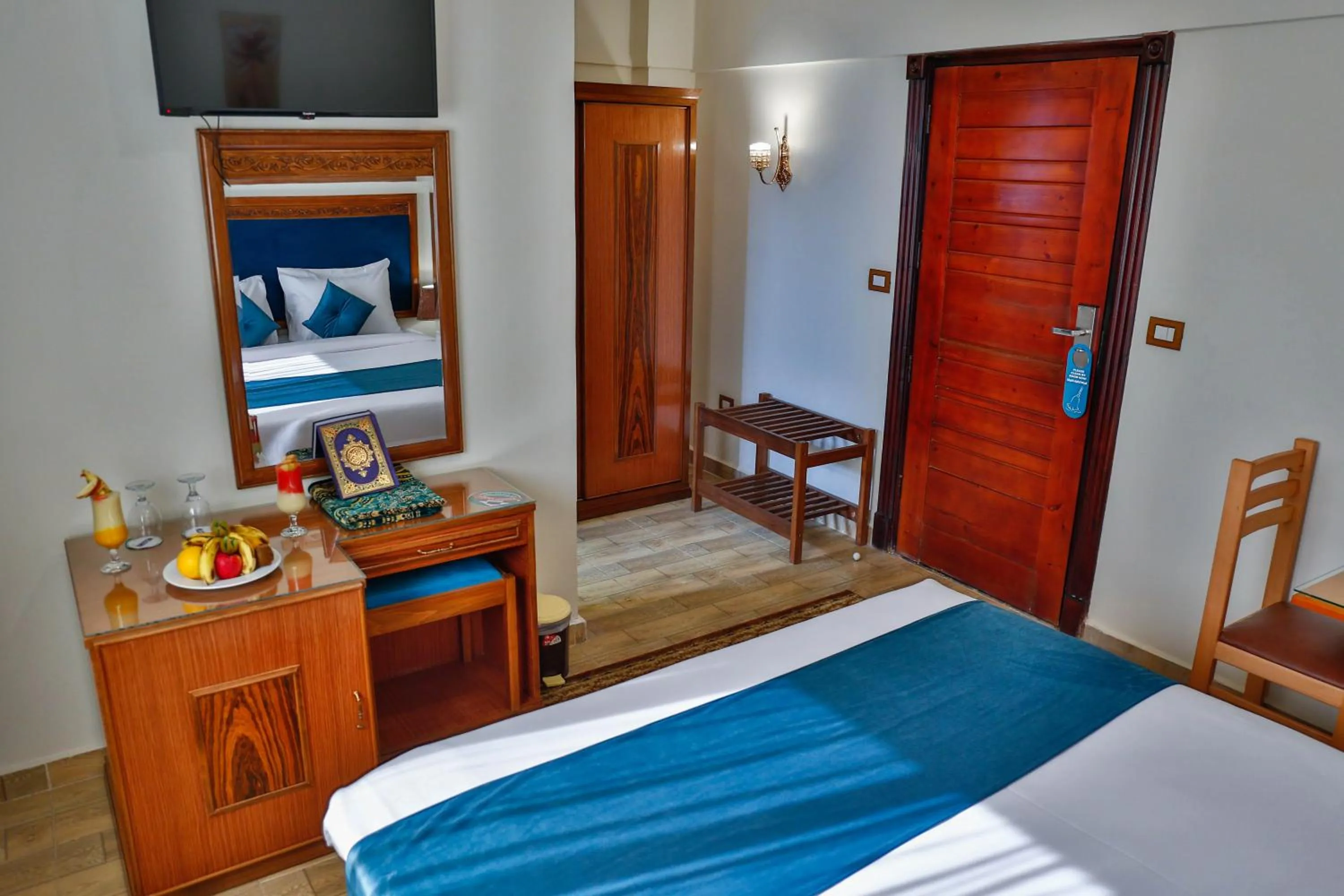 Bed in The Palm Hotel