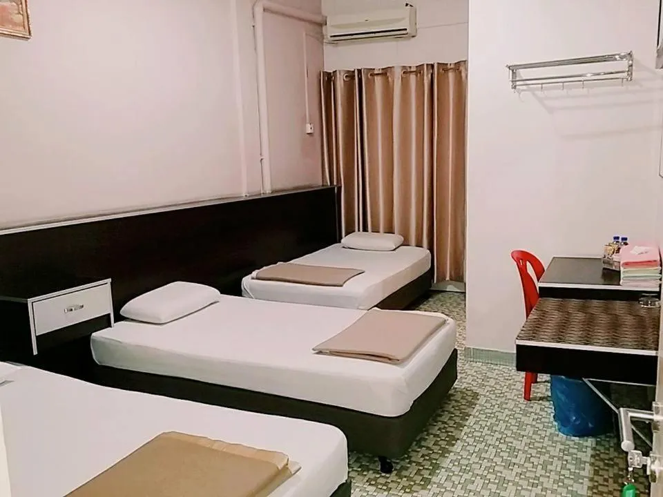 Photo of the whole room, Bed in Marina Hotel Kemaman