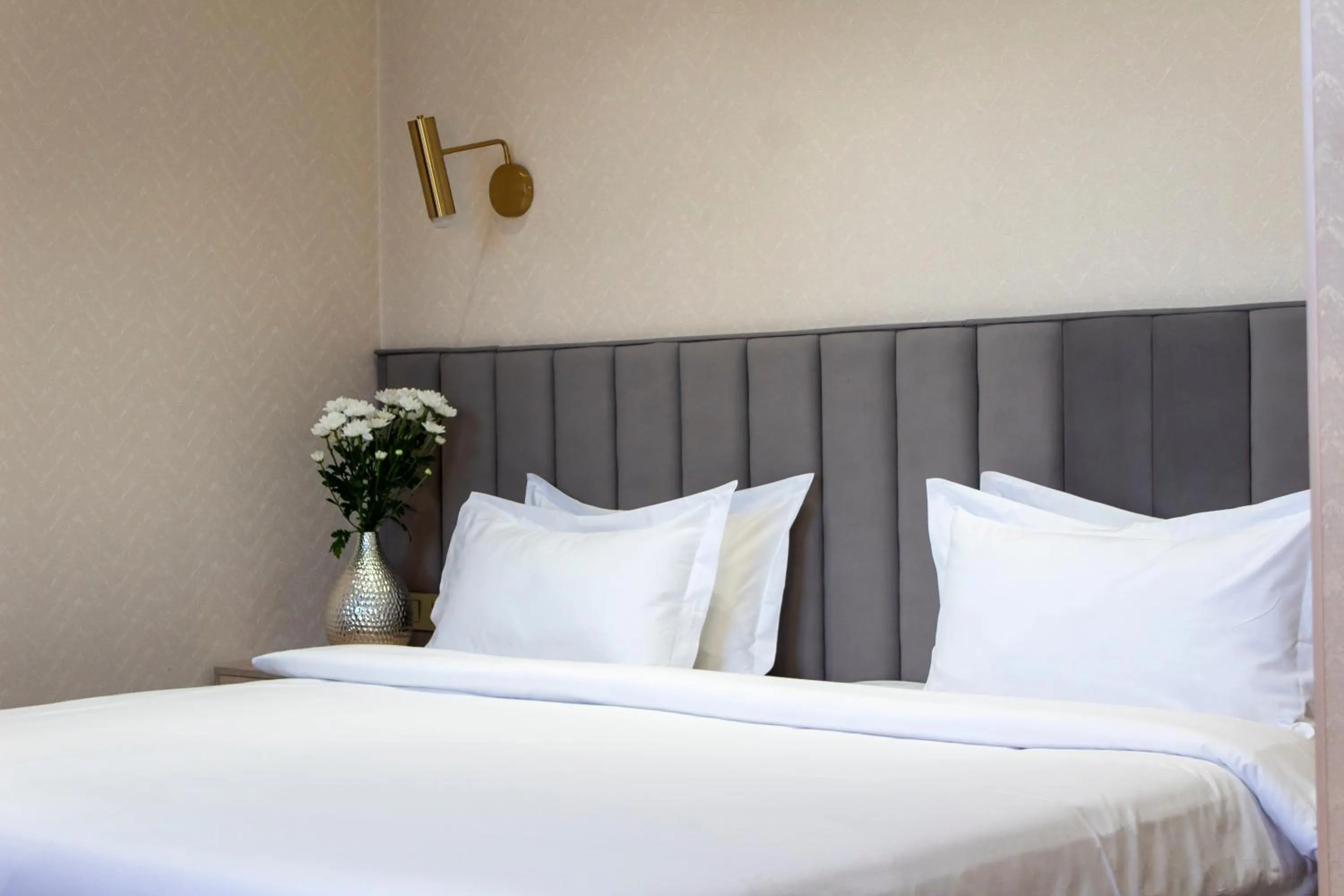 Bed in Orient Hotel Bishkek