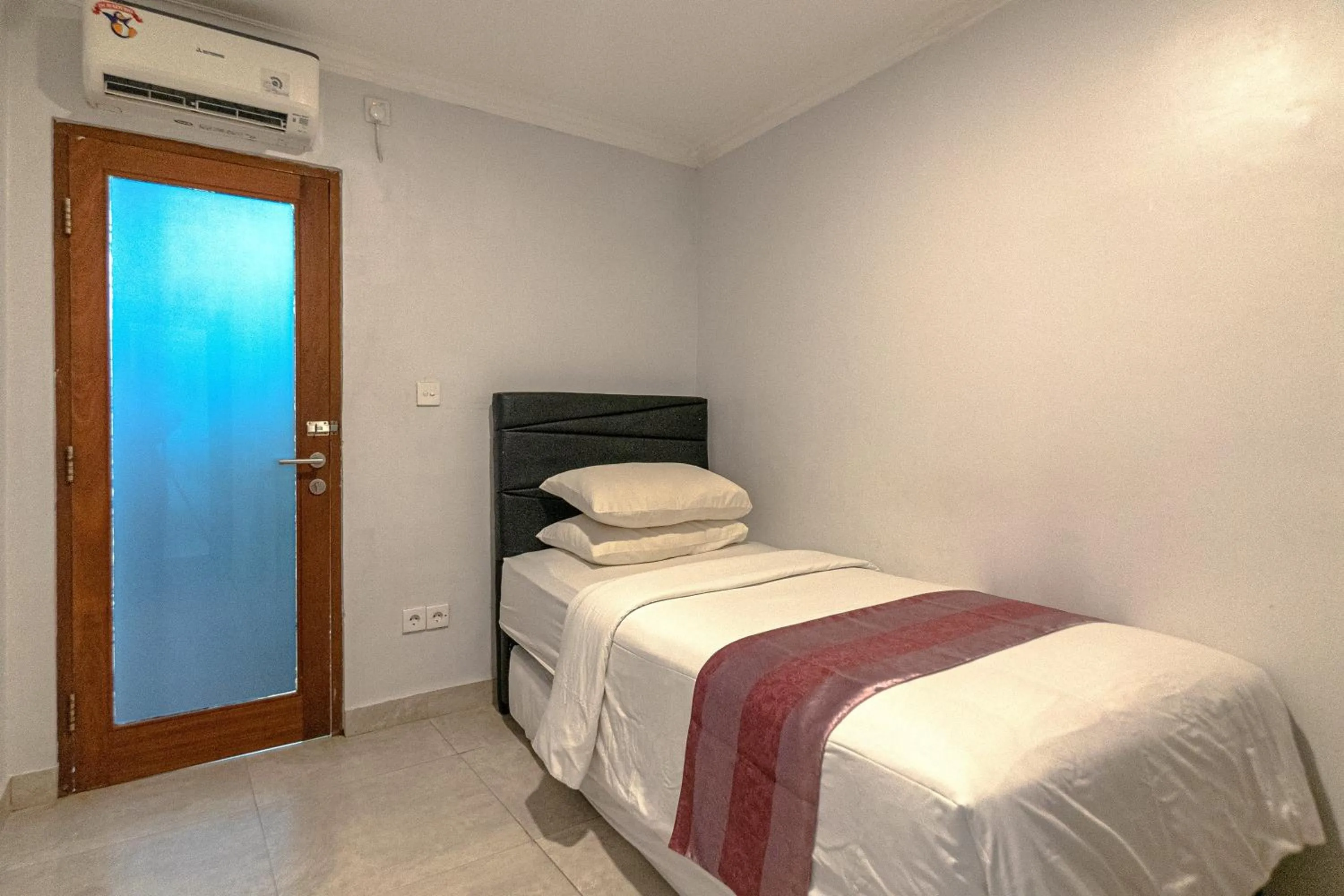 Bed in Ayuna Suites Canggu