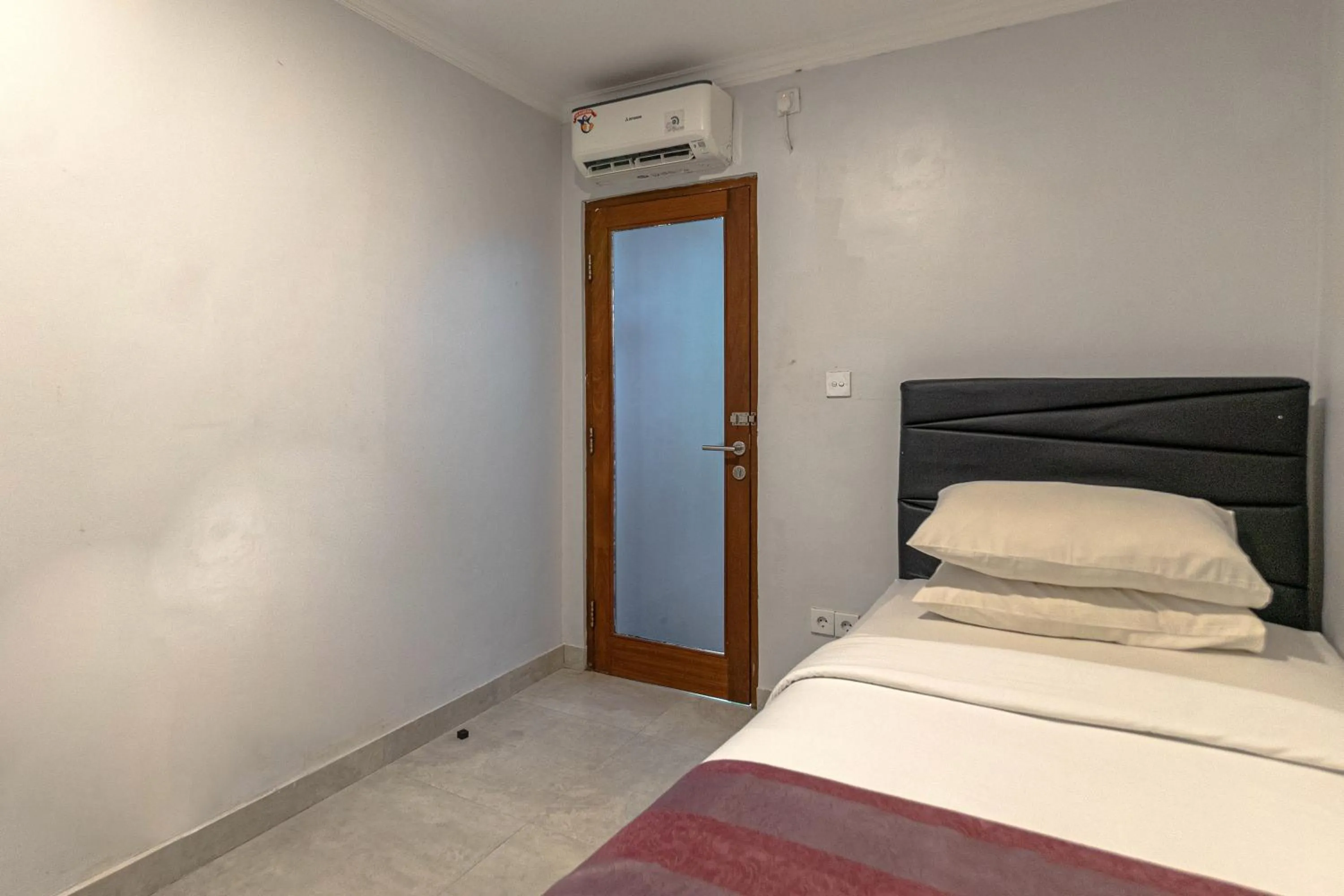 Bed in Ayuna Suites Canggu