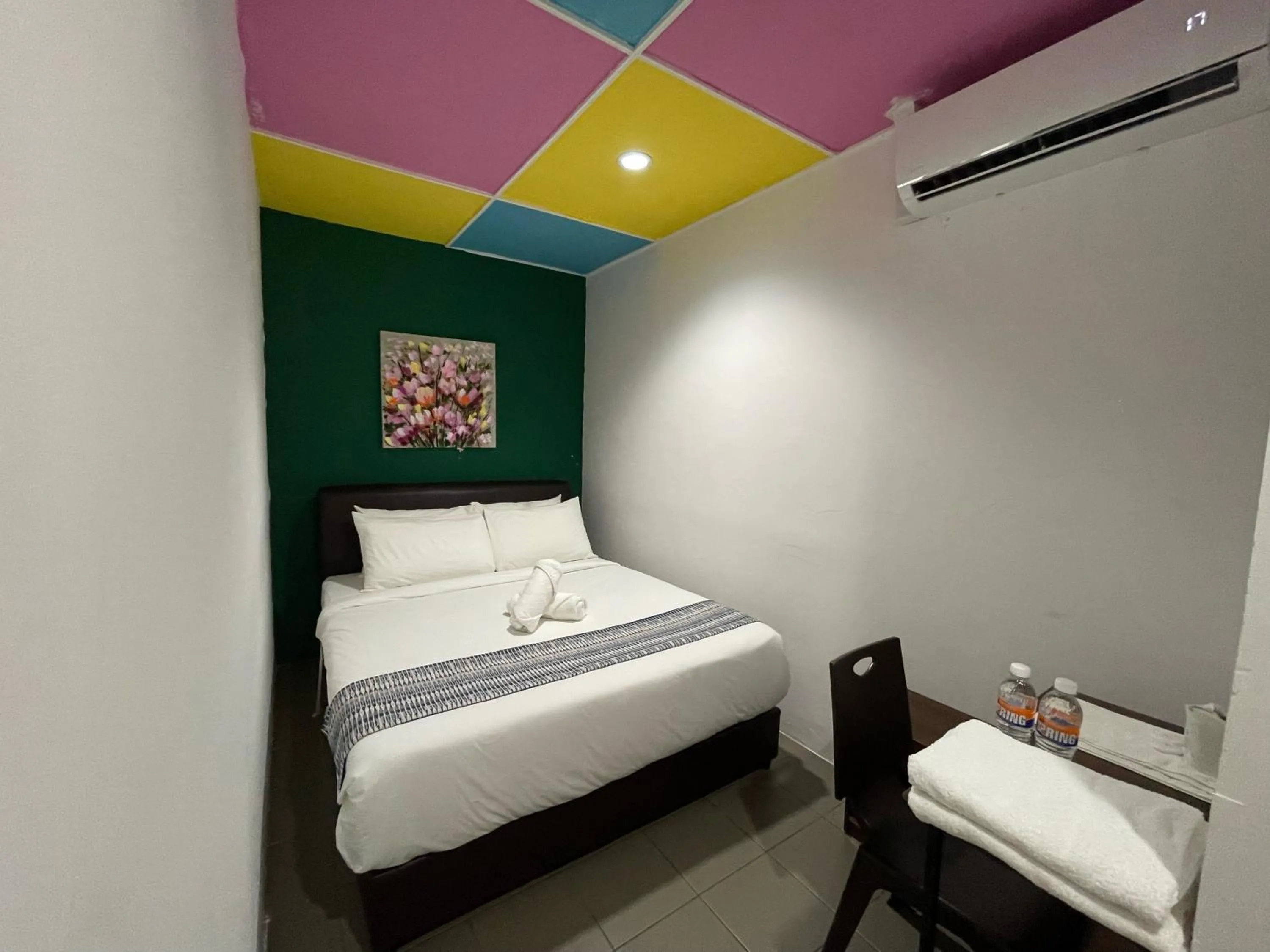 Bed in Cassia Inn Kuching