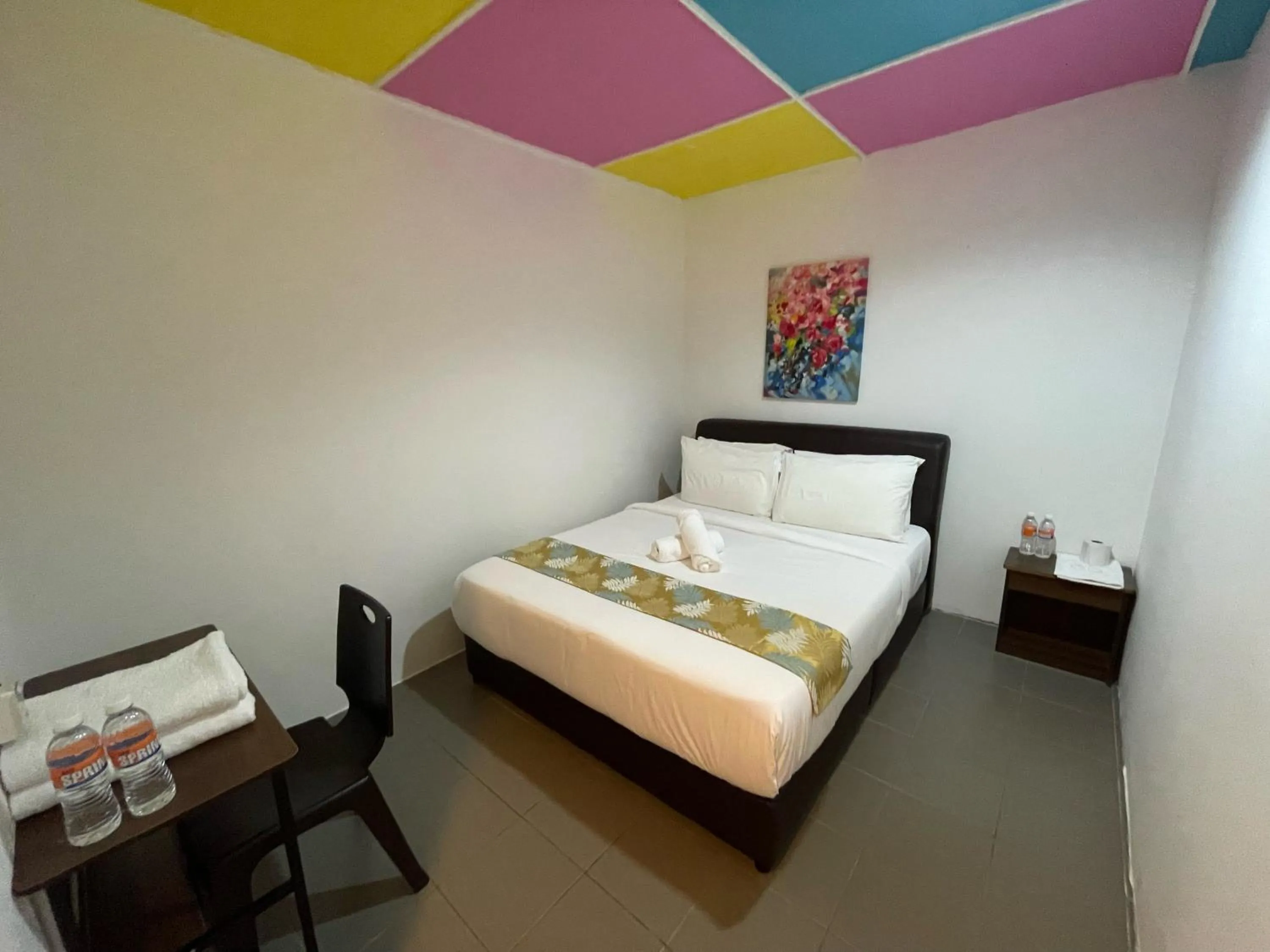 Bed in Cassia Inn Kuching