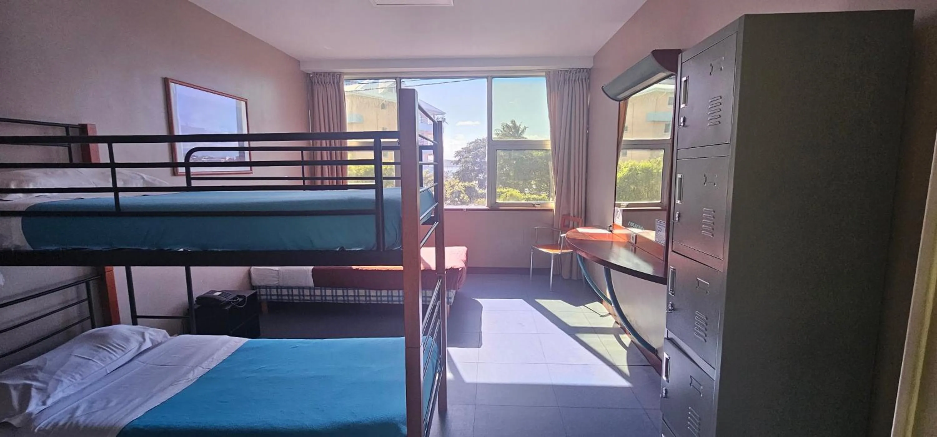 Single Bed in Male Dormitory Room in Auberge du MOCAMBO