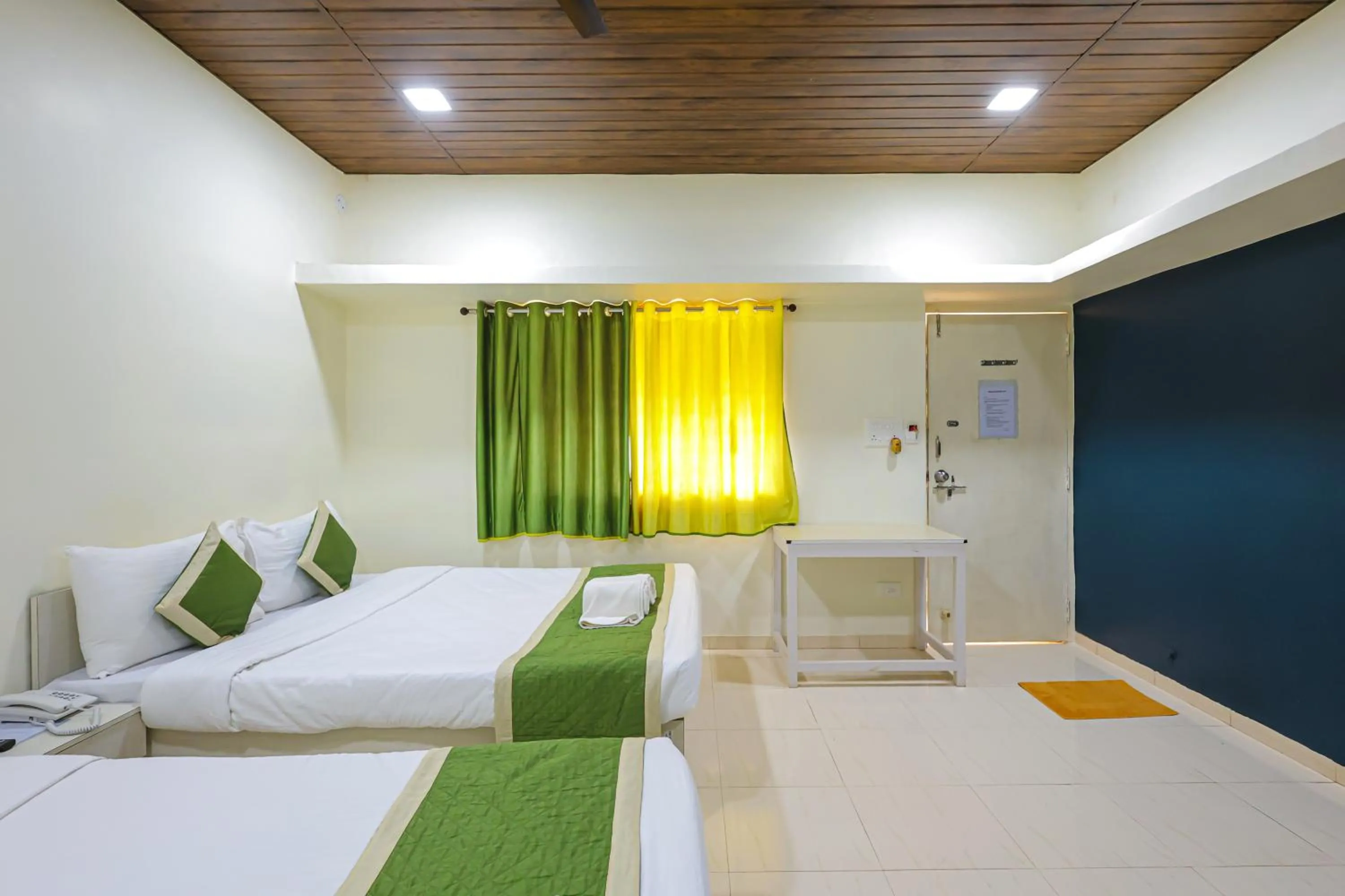 Bed in Kokanwadi Resort