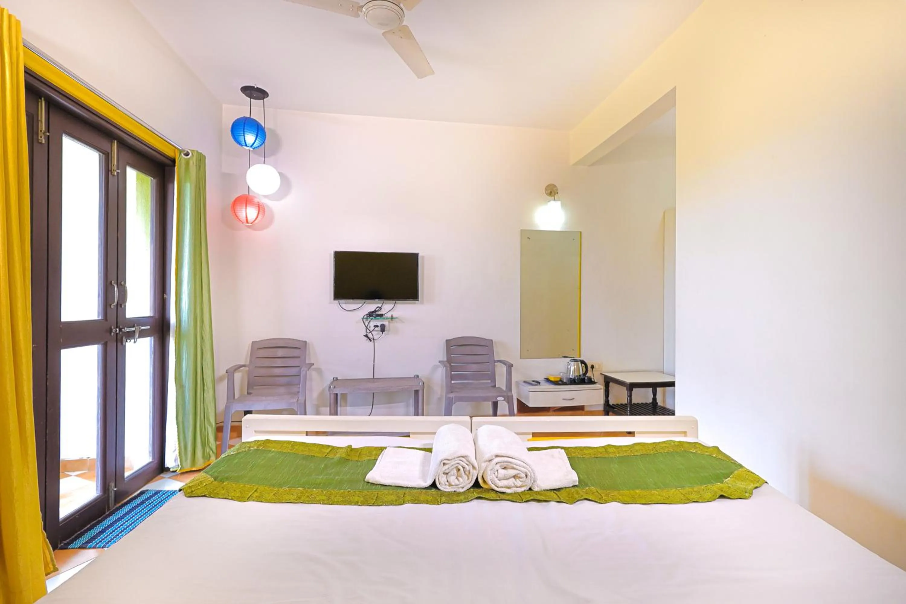 Bed in Kokanwadi Resort