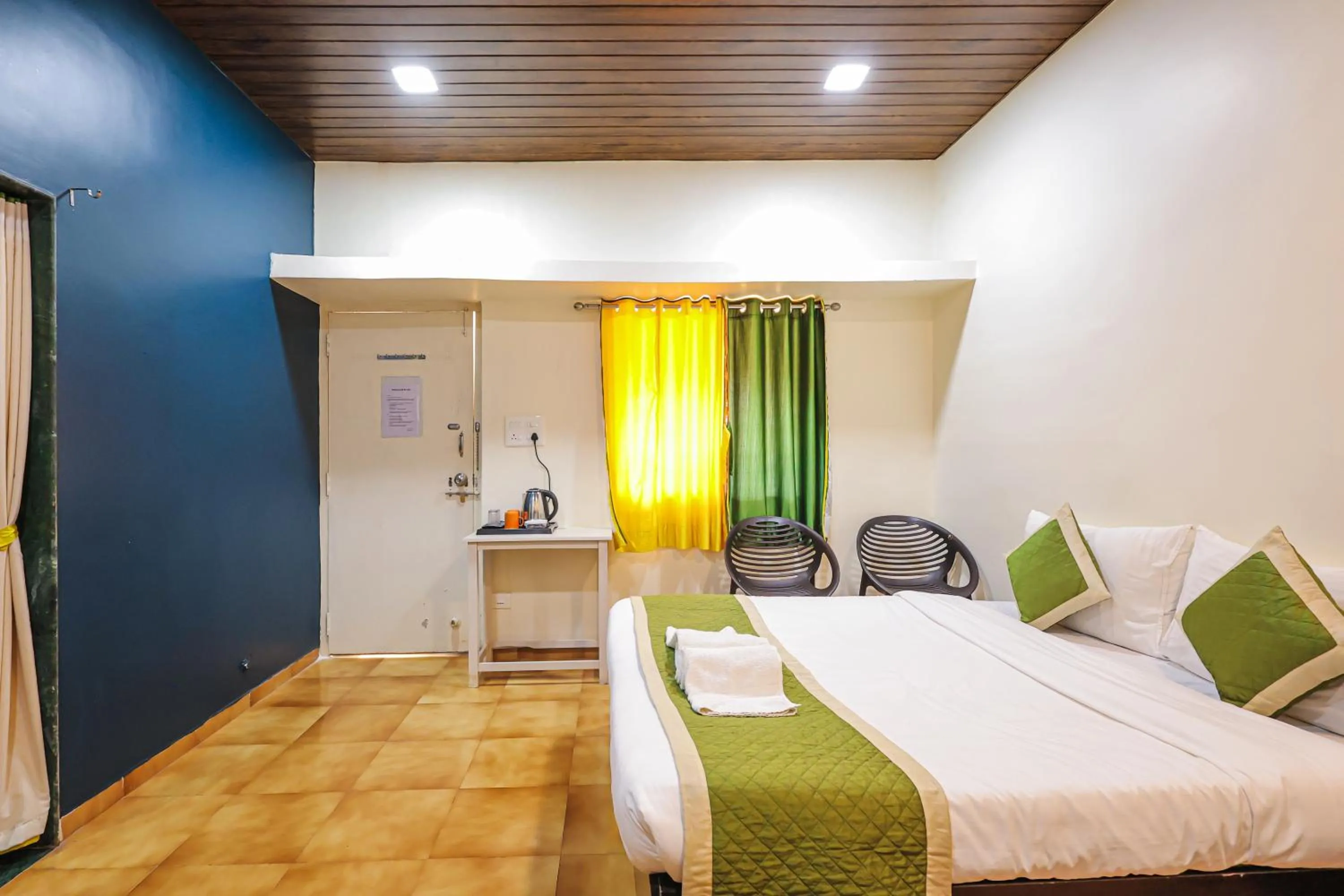 Bed in Kokanwadi Resort