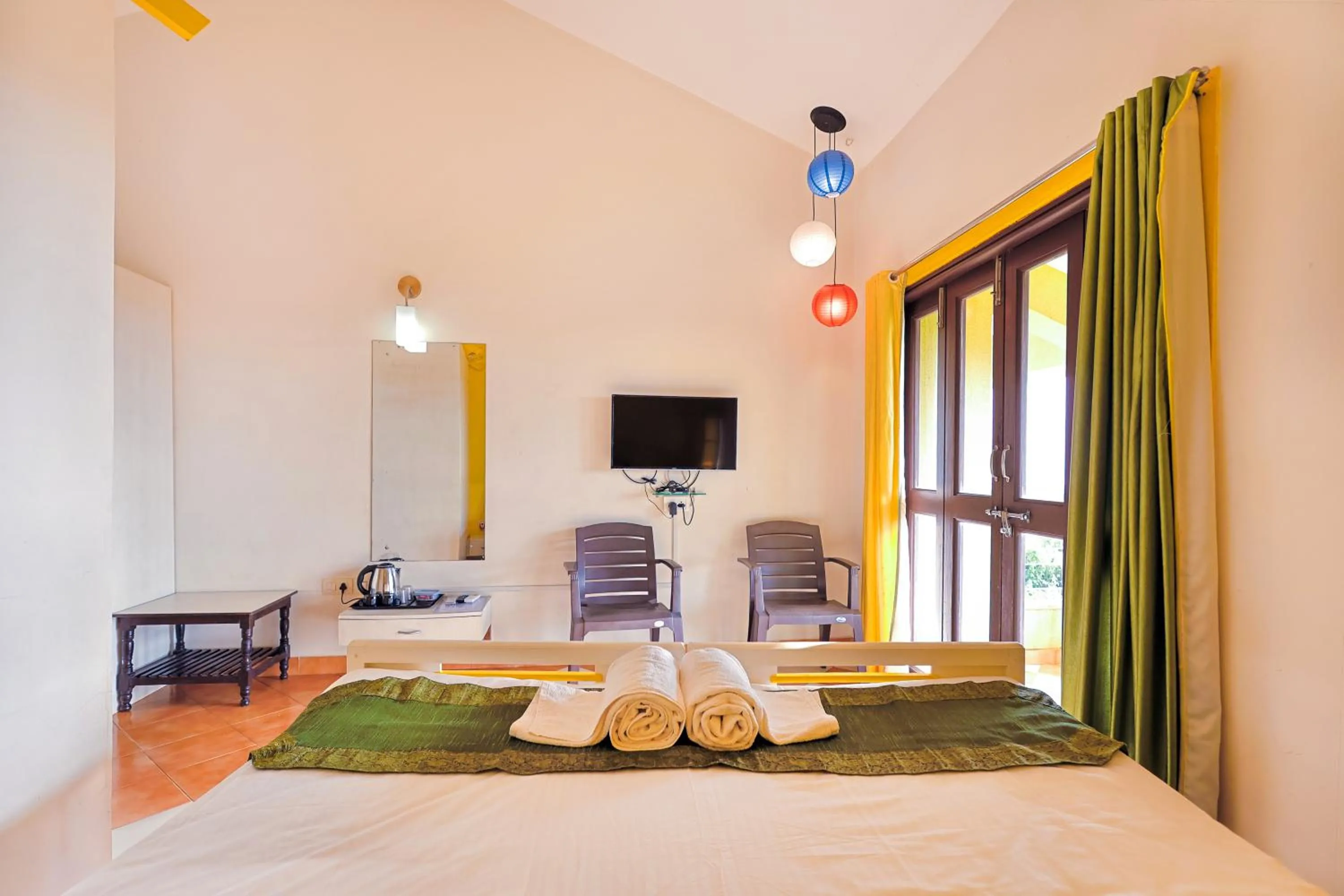 Bed in Kokanwadi Resort