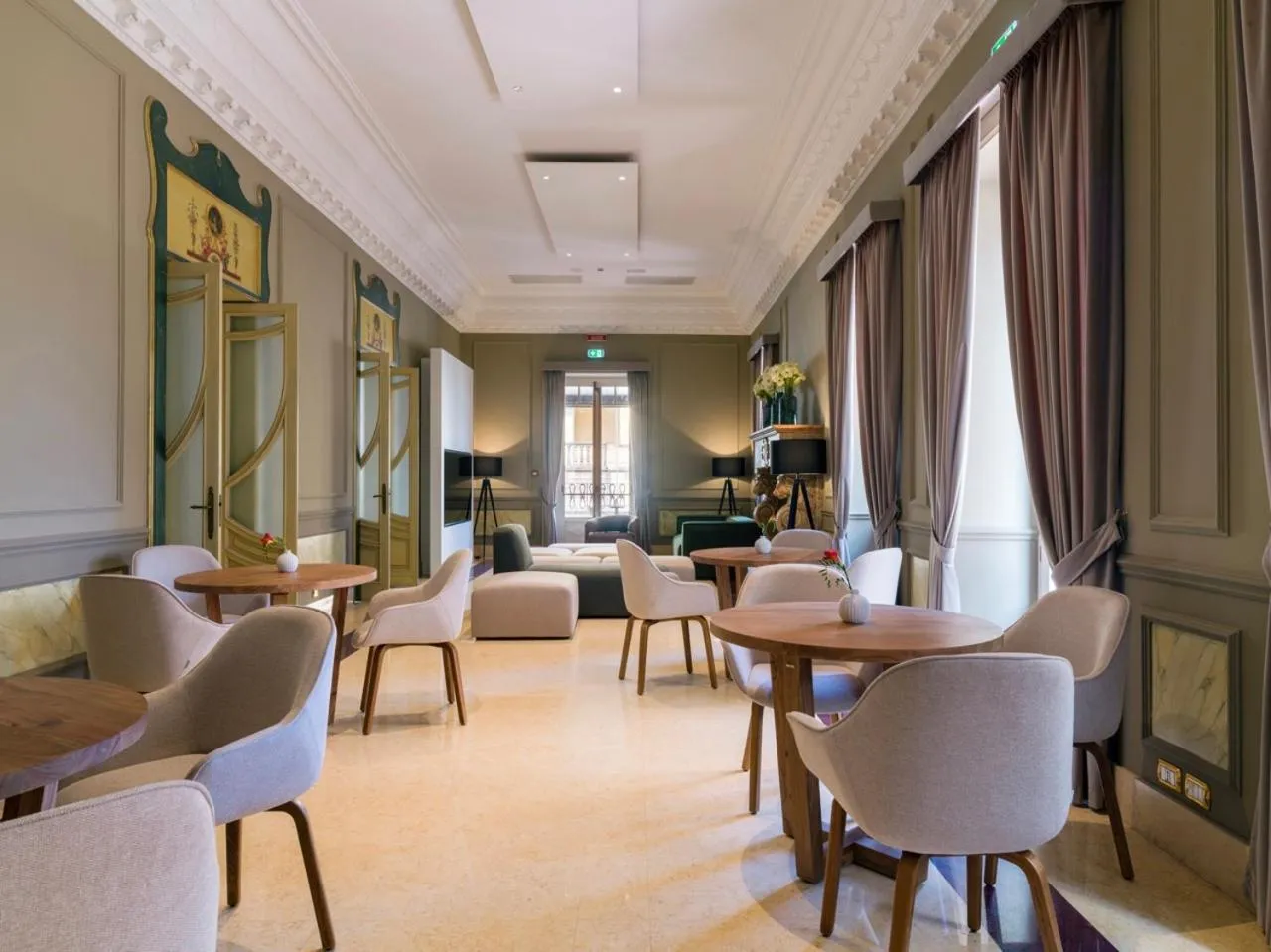 Seating area in UNA Hotels One Catania