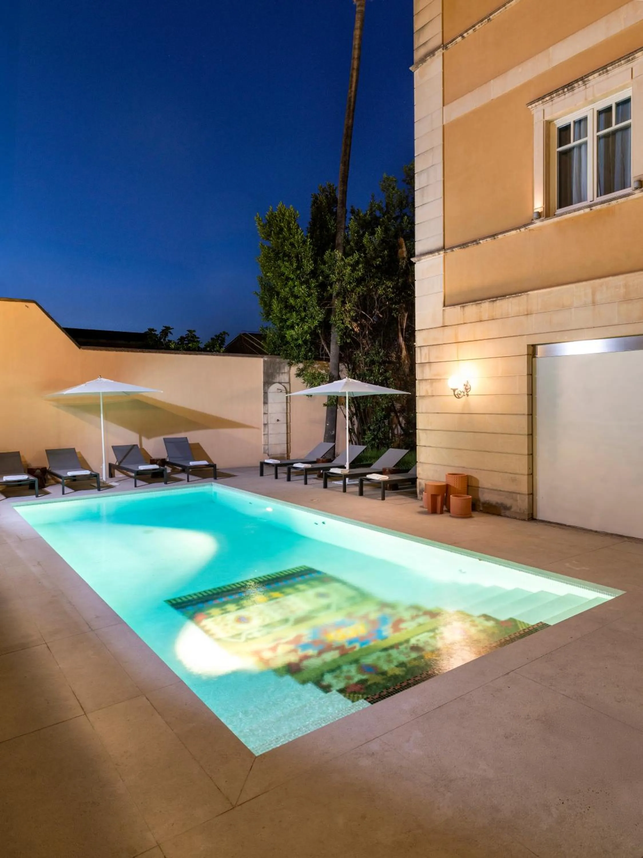 Swimming pool in UNA Hotels One Catania