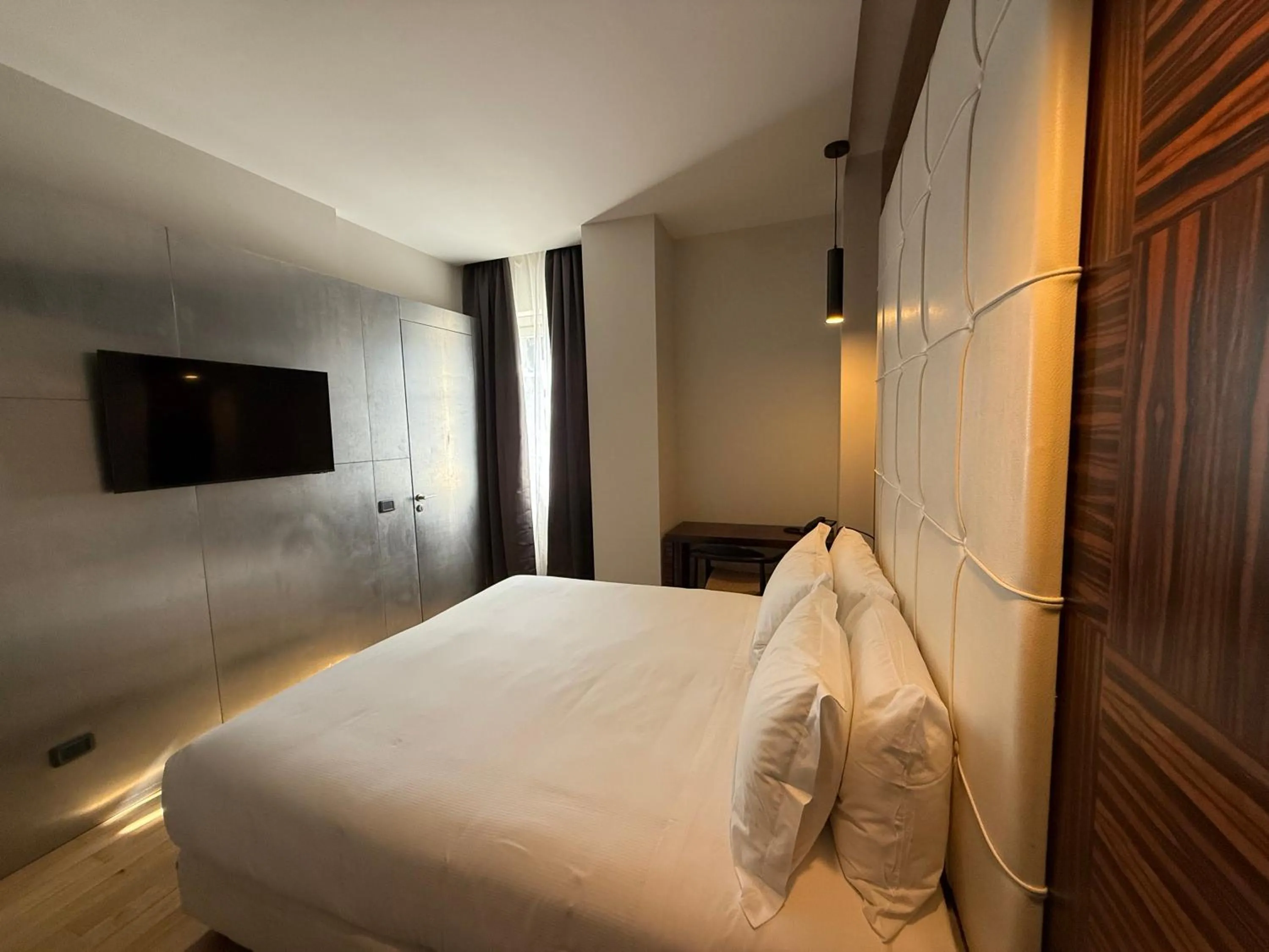 Bed in UNA Hotels One Catania