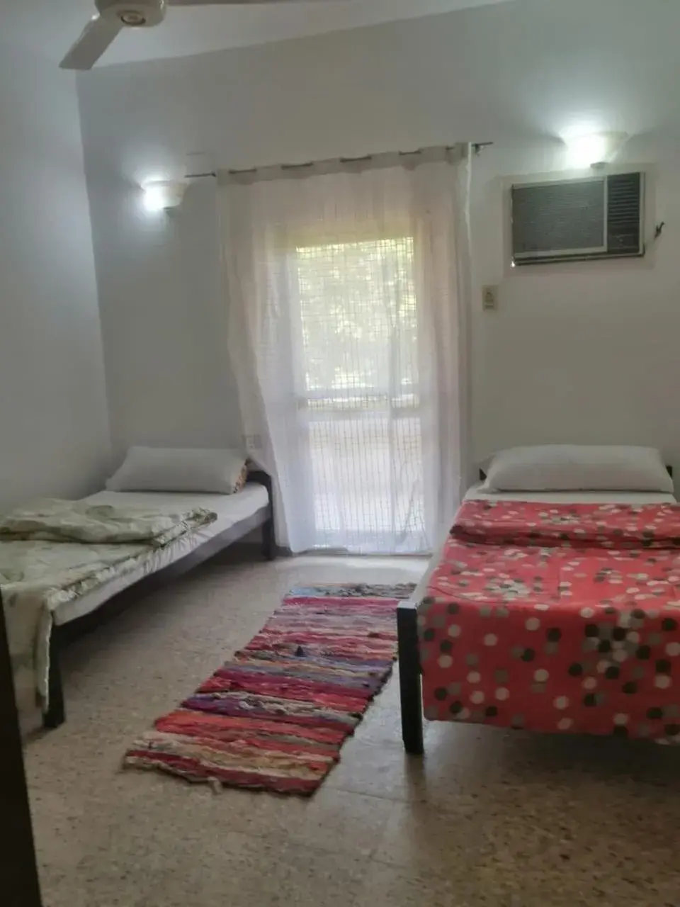 Quadruple Room with Garden View in Rose Guest House Quadruple Room with Garden View in Rose Guest House