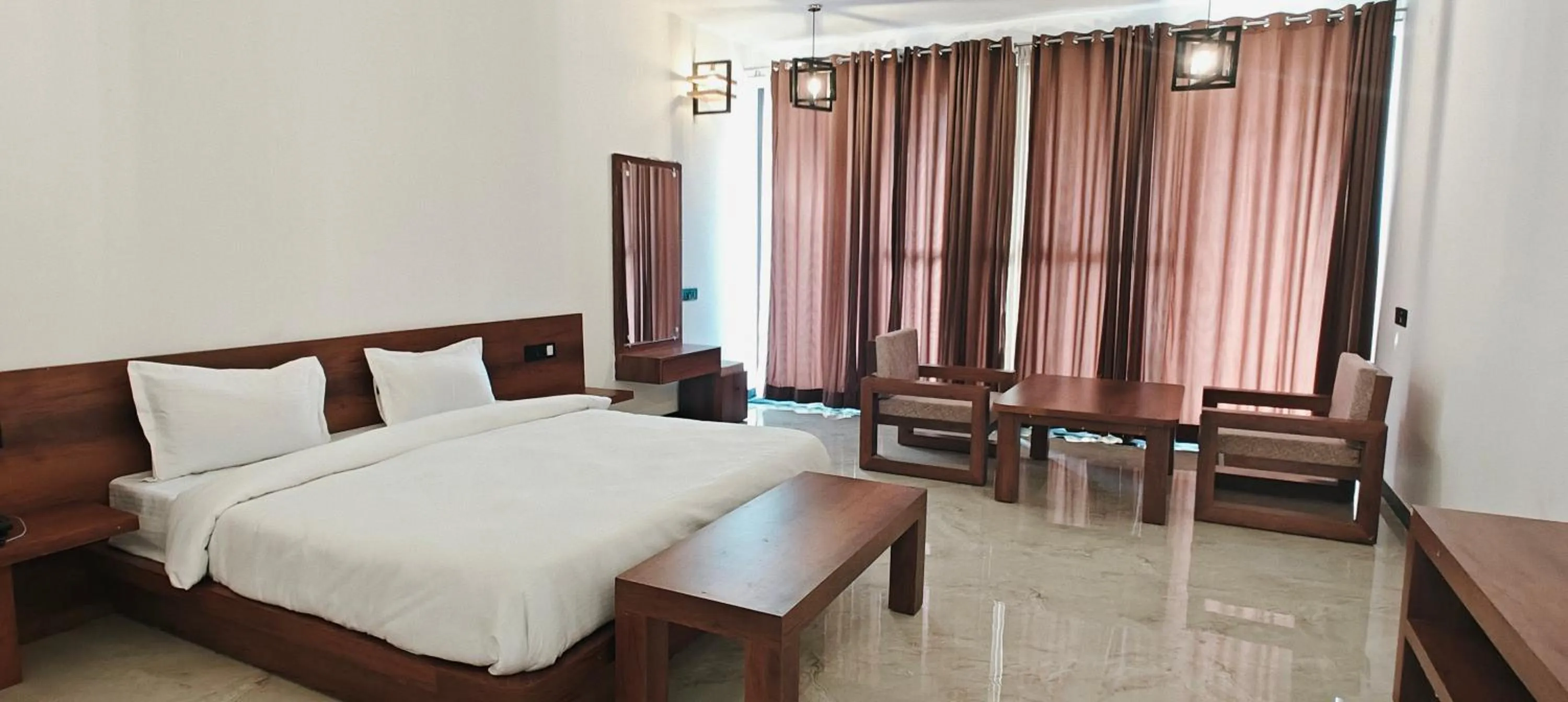 Bed in The HighGarden Resort