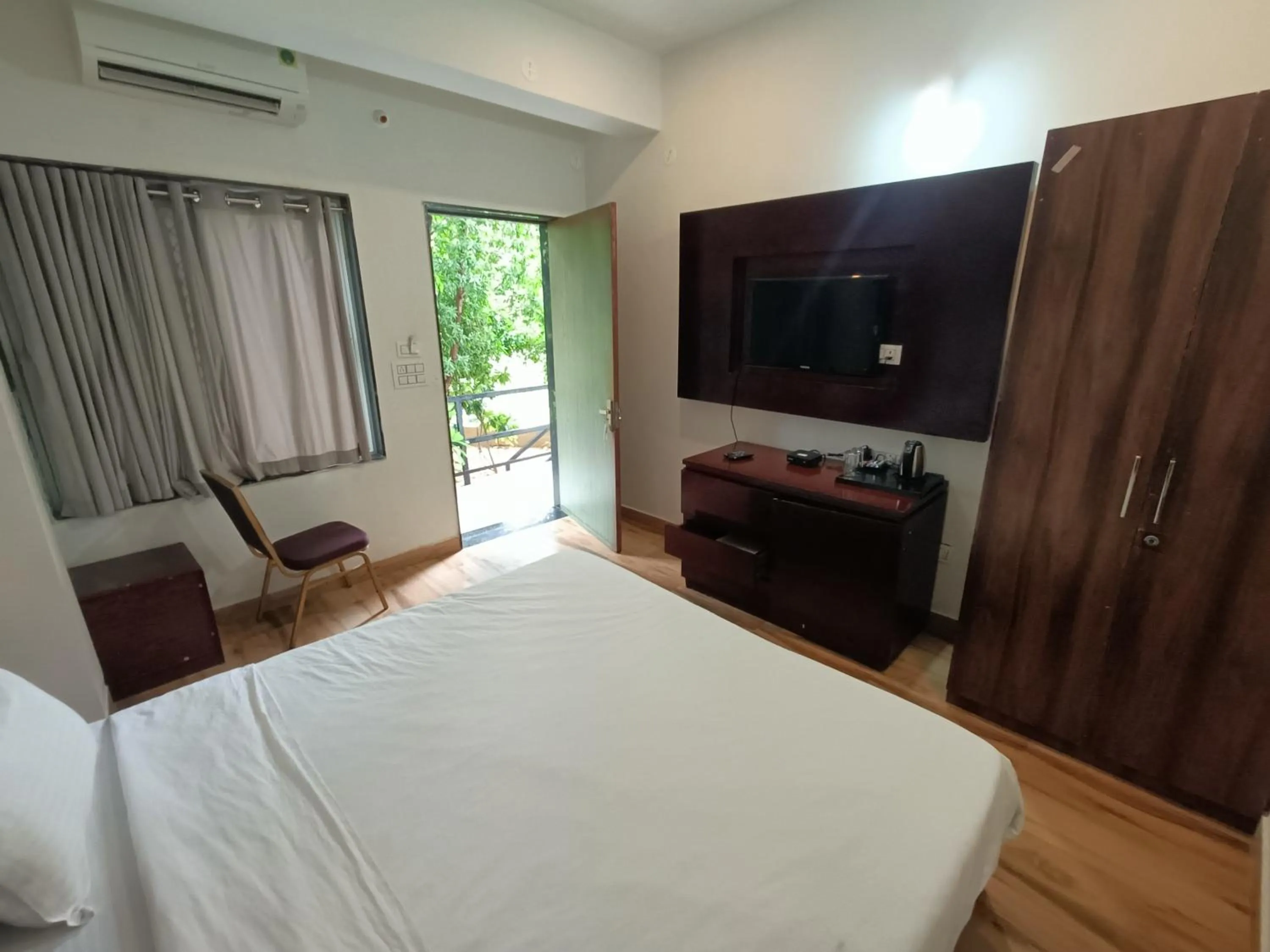 Bed in The HighGarden Resort