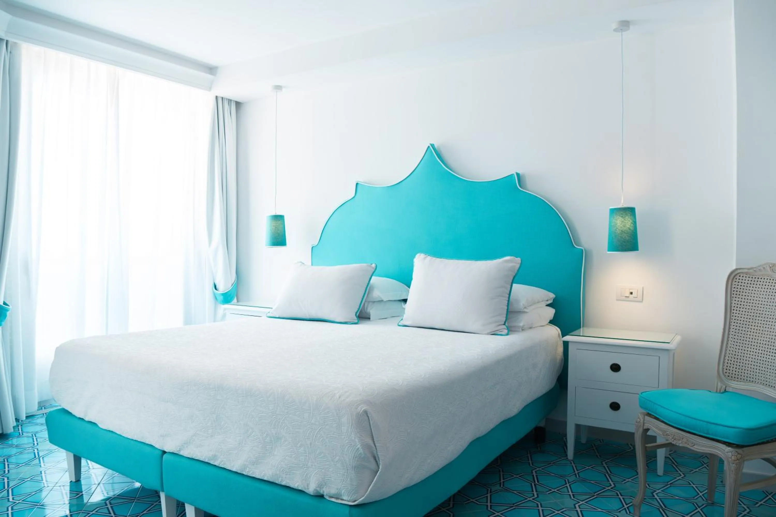 Bed in Hotel Conca d'Oro