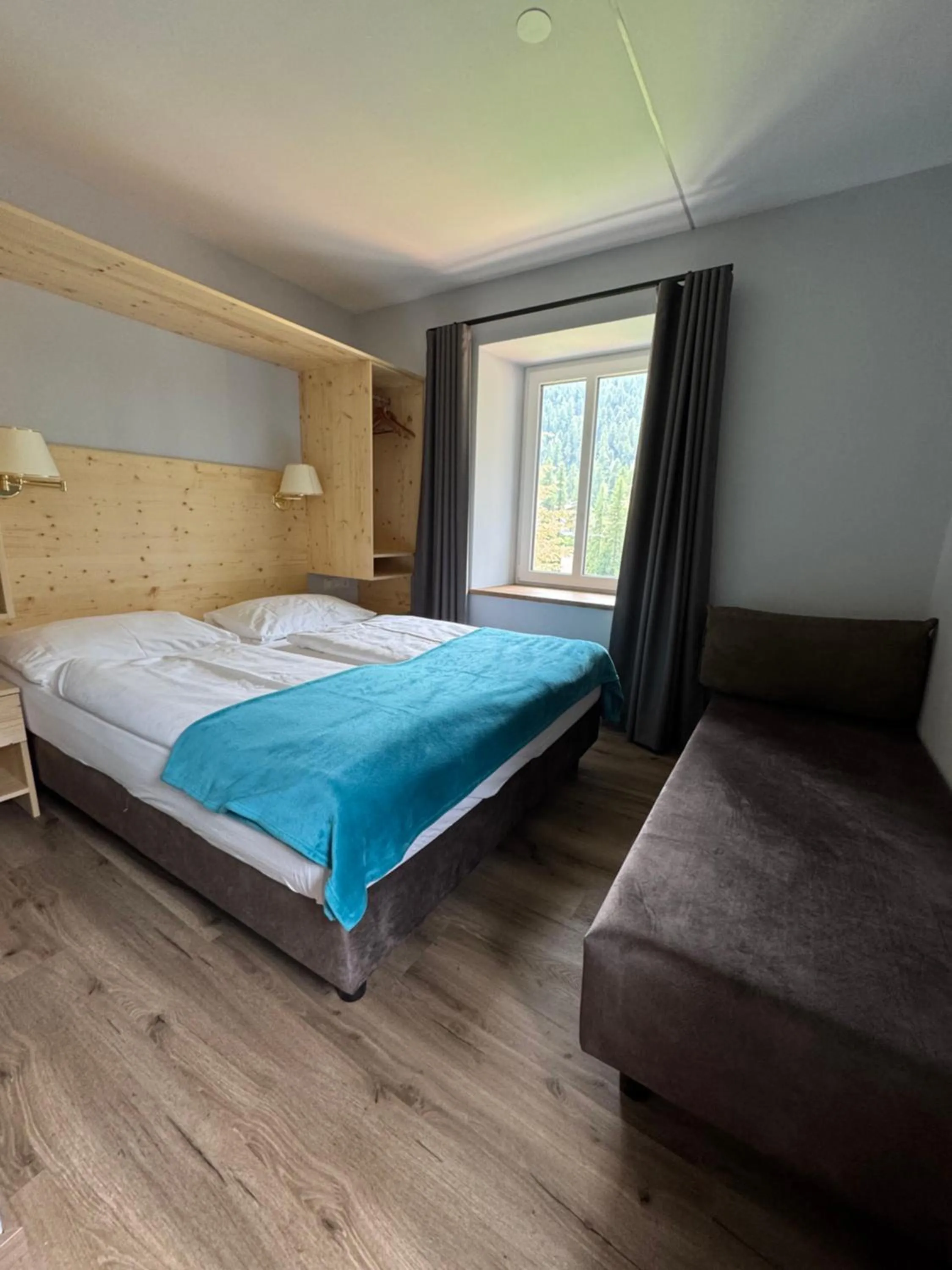 Bed in Glacier Rock guesthouse ex Pension Dangl