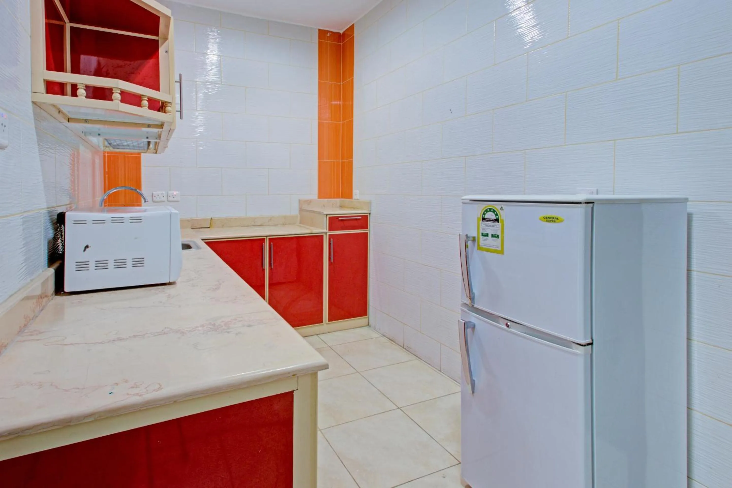 Kitchen or kitchenette, Kitchen/Kitchenette in OYO 601 Ibs For Residential Units