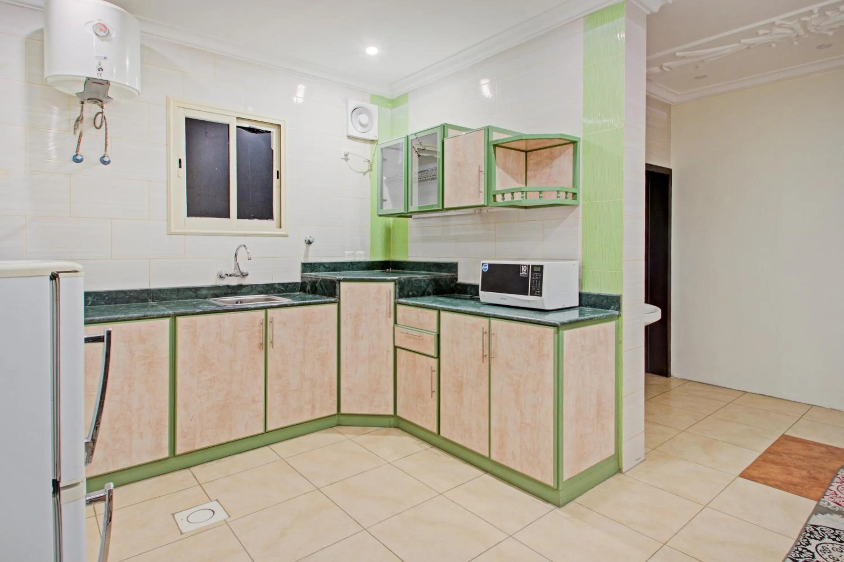 Kitchen or kitchenette, Kitchen/Kitchenette in OYO 601 Ibs For Residential Units