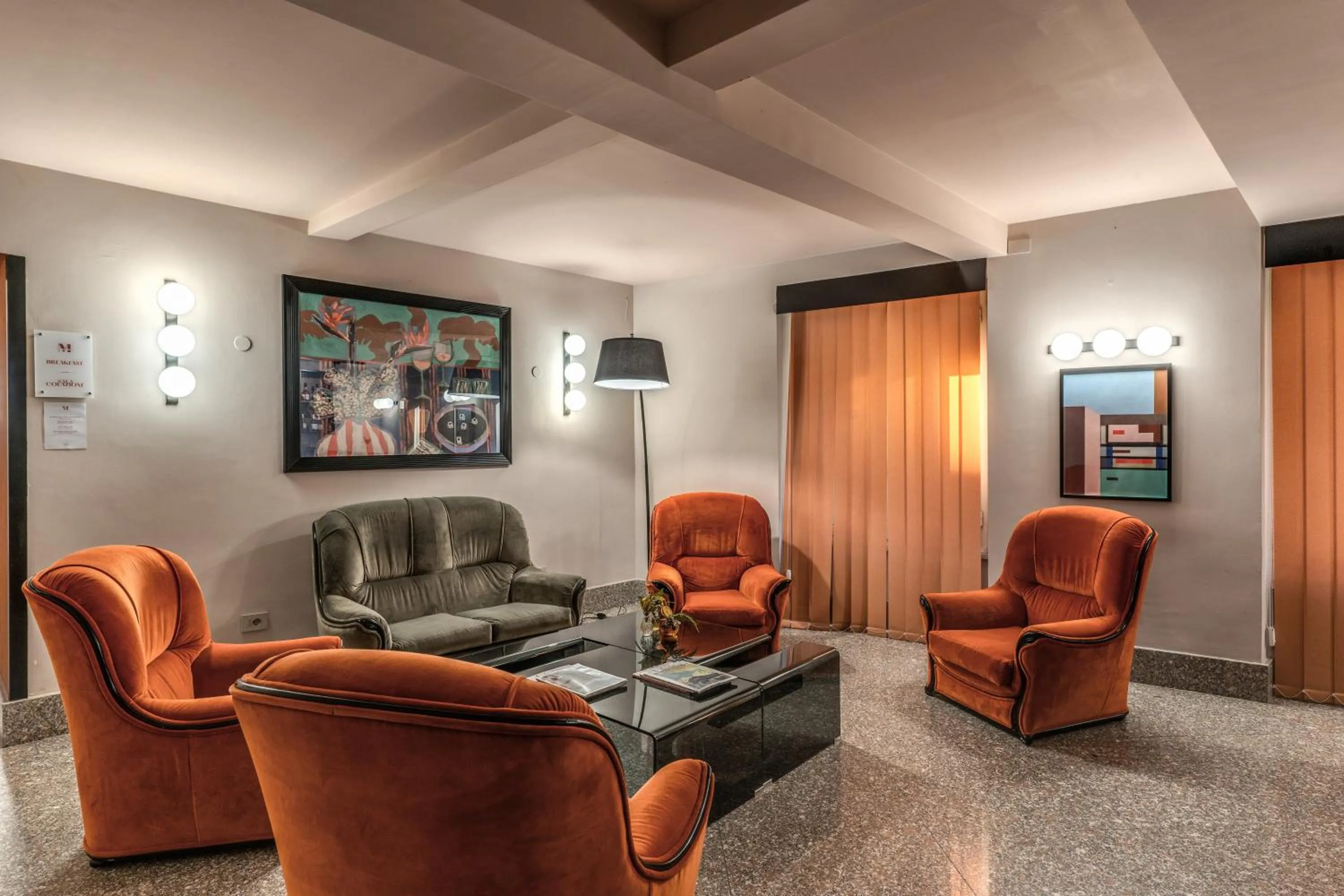 Communal lounge/ TV room in Madison Hotel