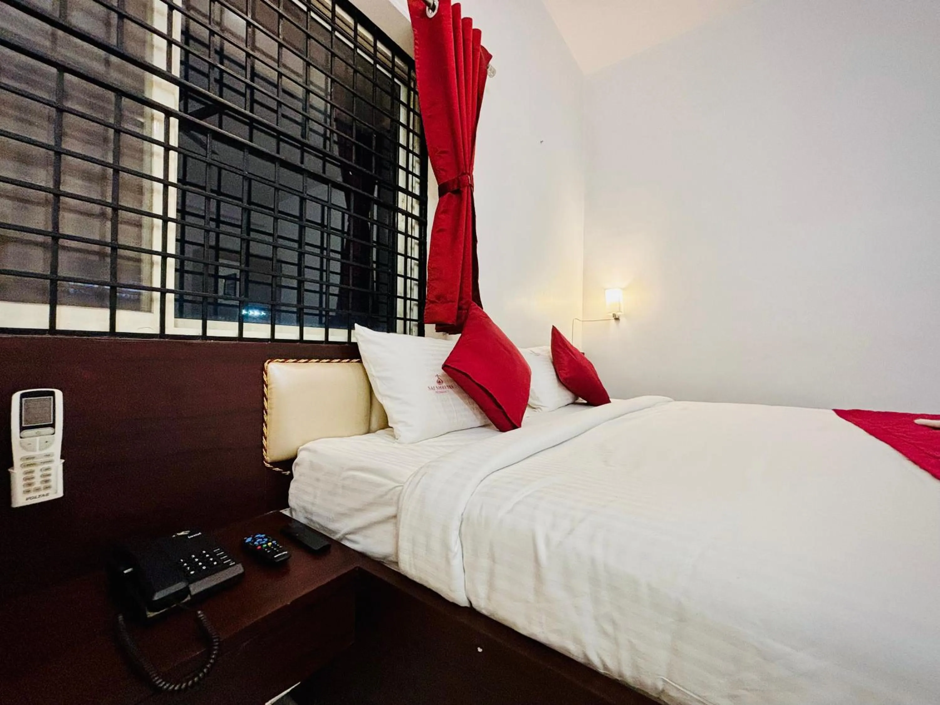 Bed in Sai Shreyas Residency, Boutique Hotel near Bangalore Airport