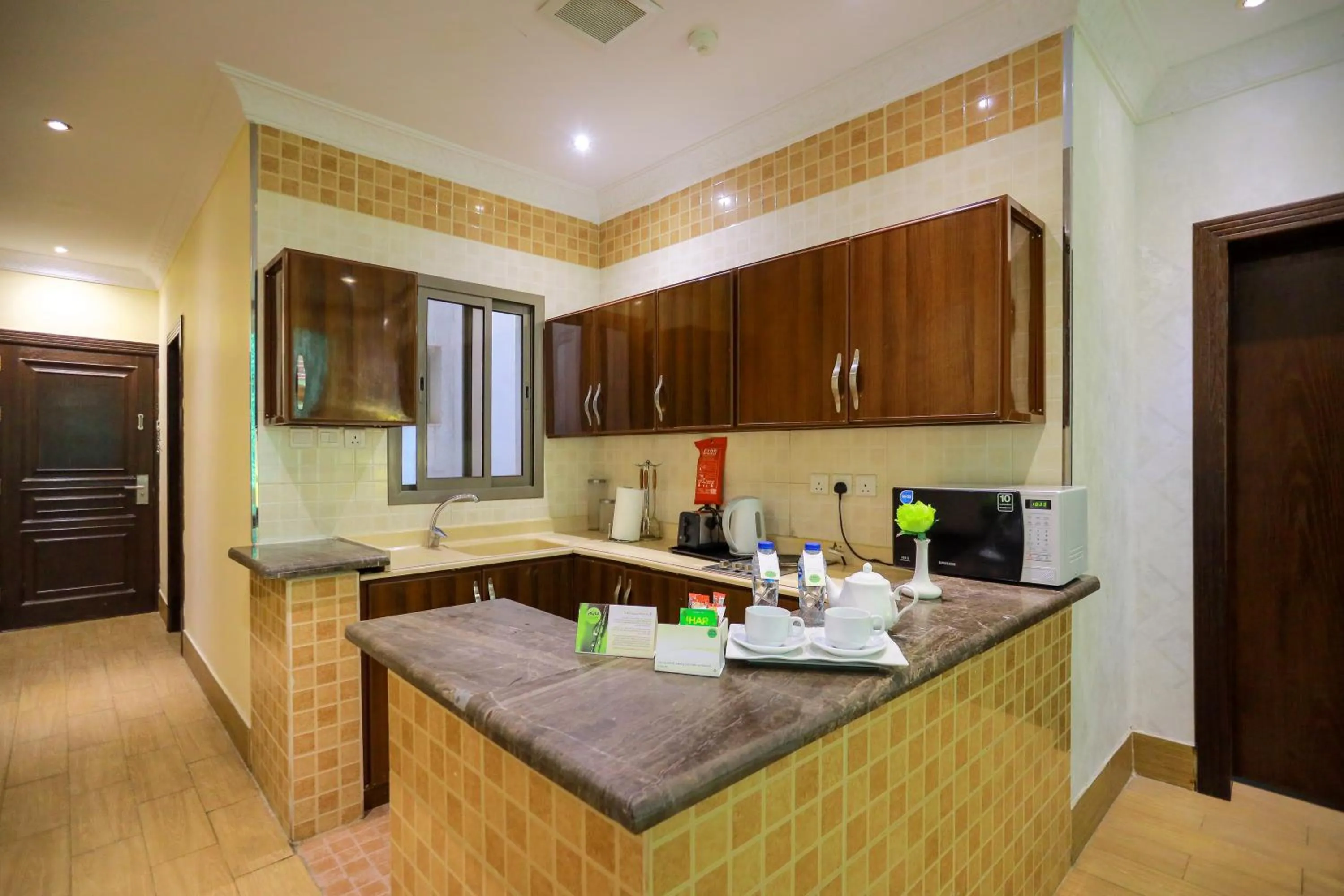 kitchen in Hospitality Path Serviced Apartments