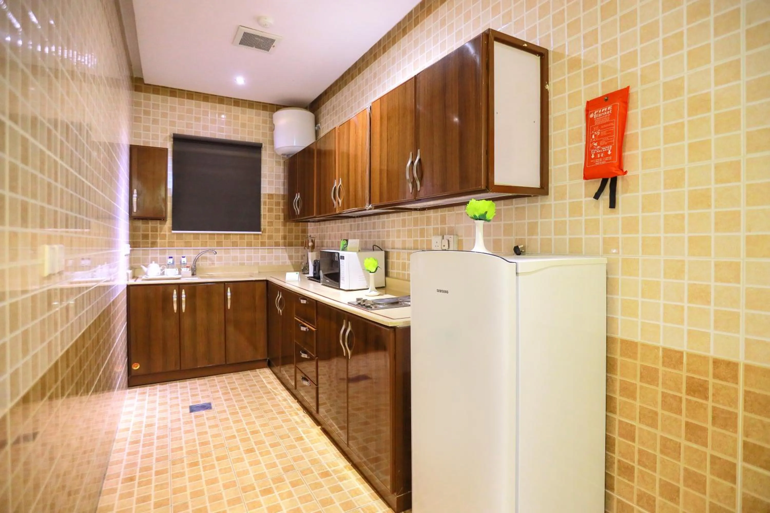 kitchen in Hospitality Path Serviced Apartments