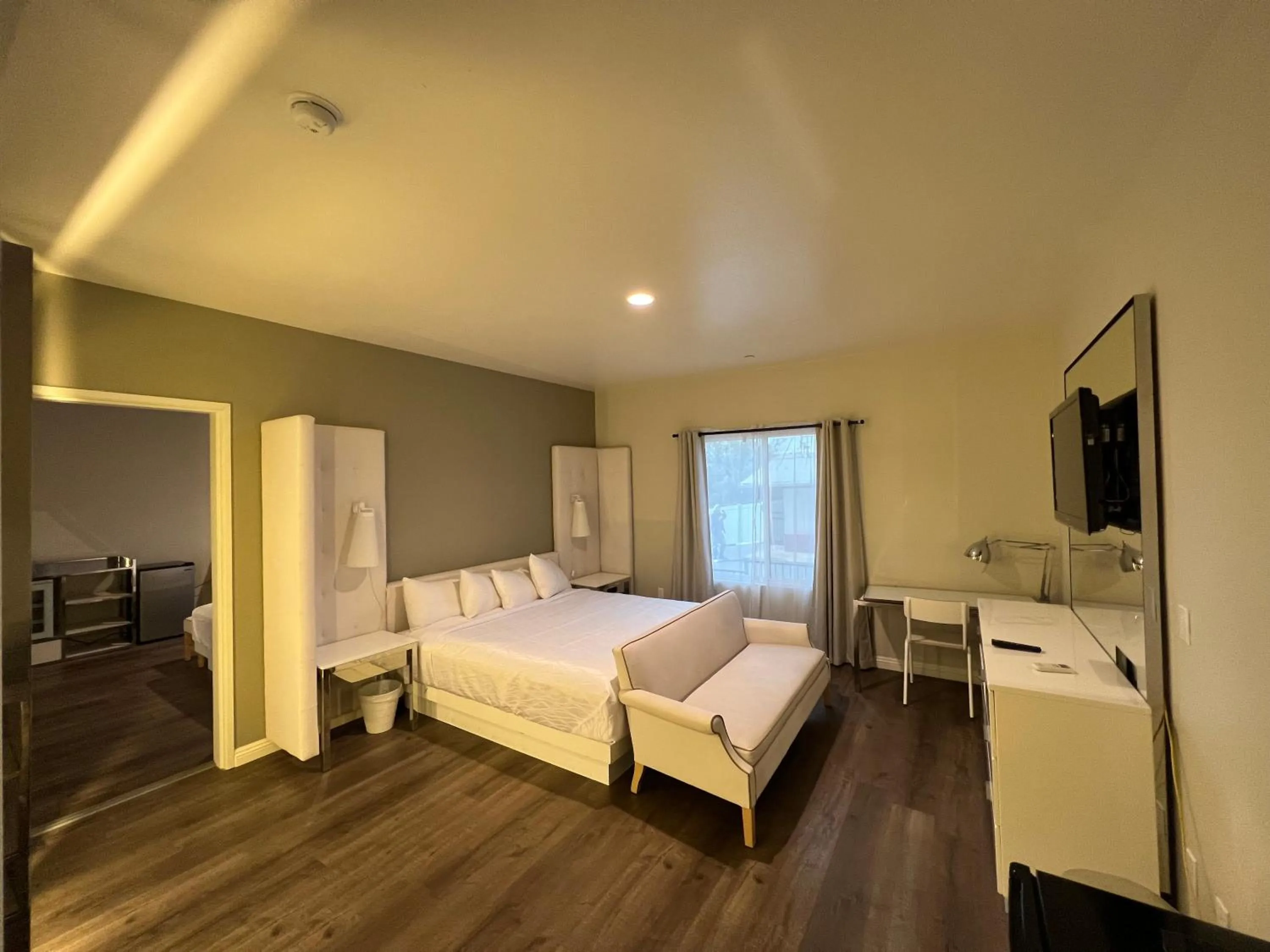 Photo of the whole room, Bed in ASPIRE INN & SUITES Orange
