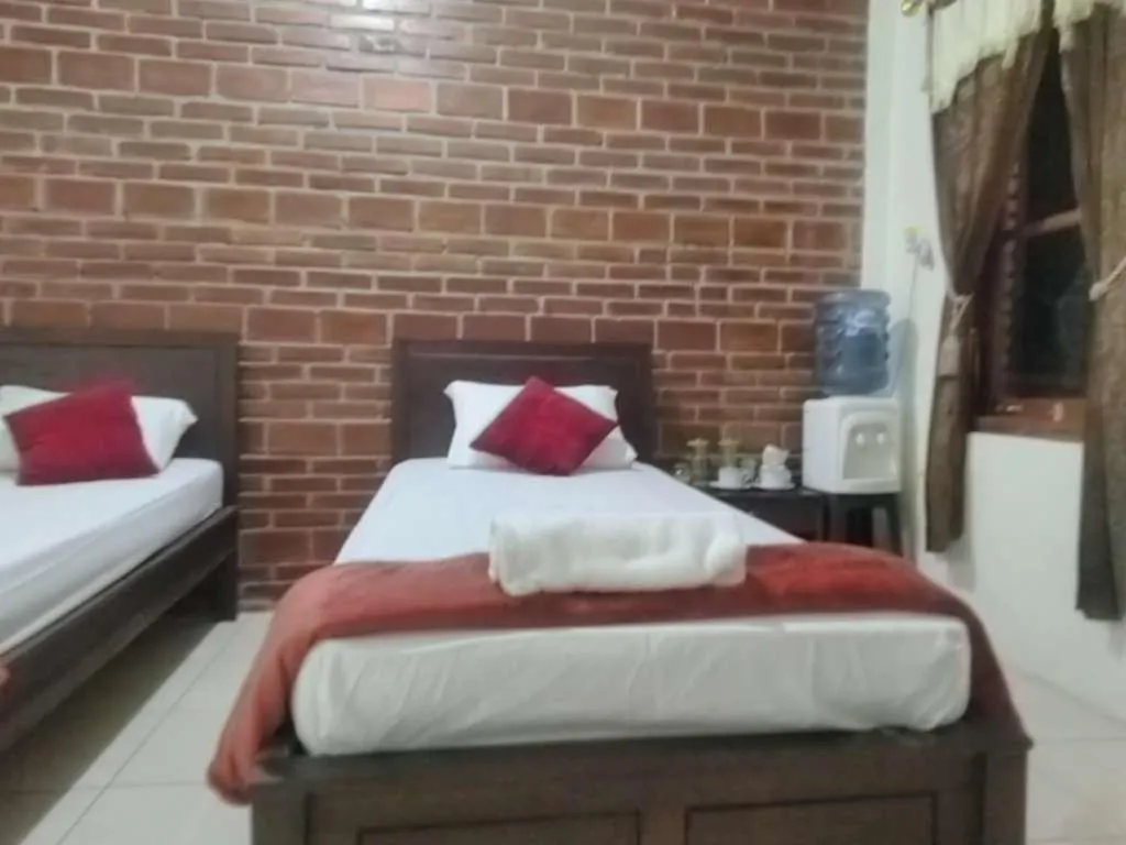 Bed in Penginapan Homestay Mudiyono Syari'ah