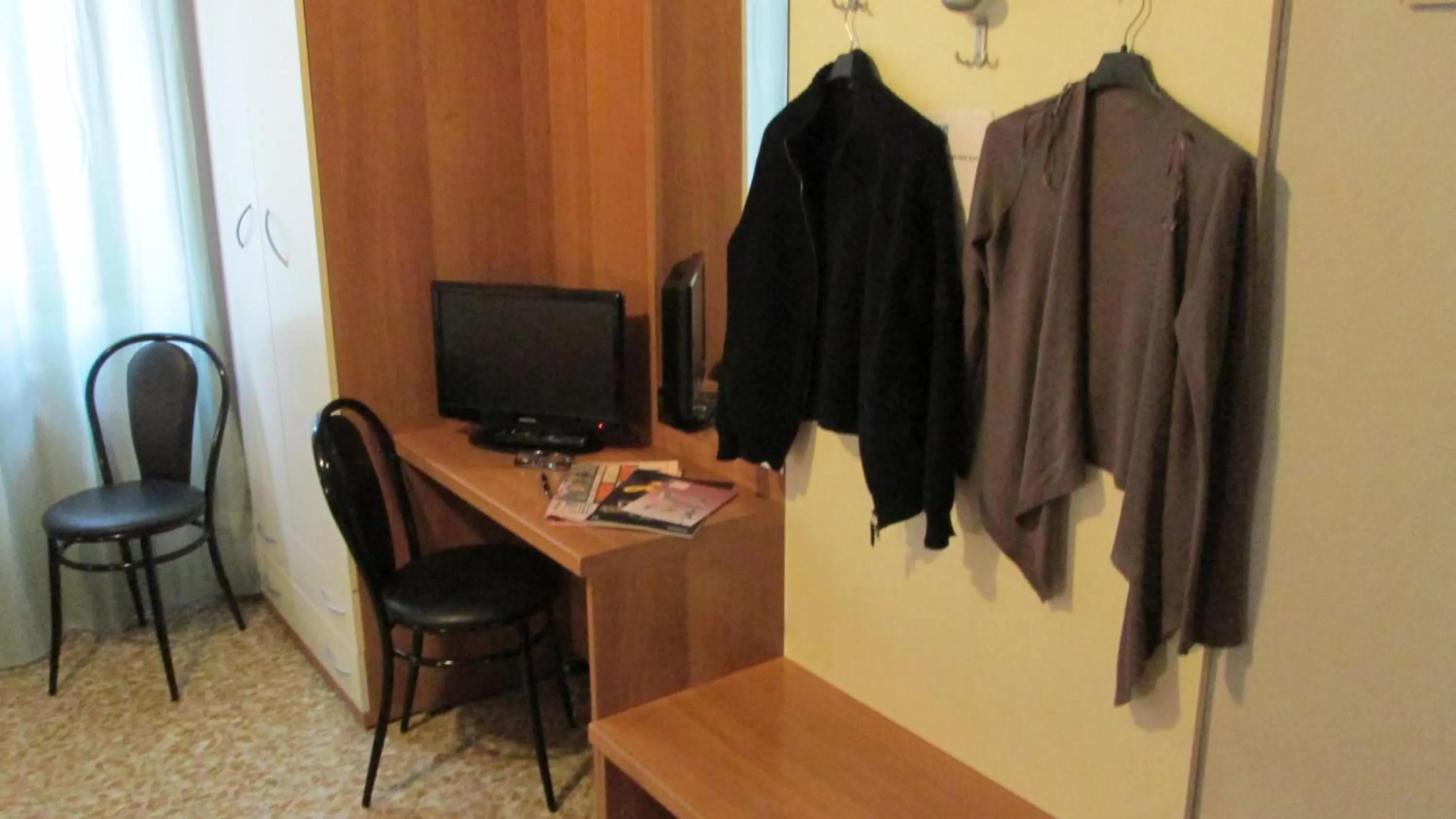 Day, TV/Entertainment Center in Ca' Grande