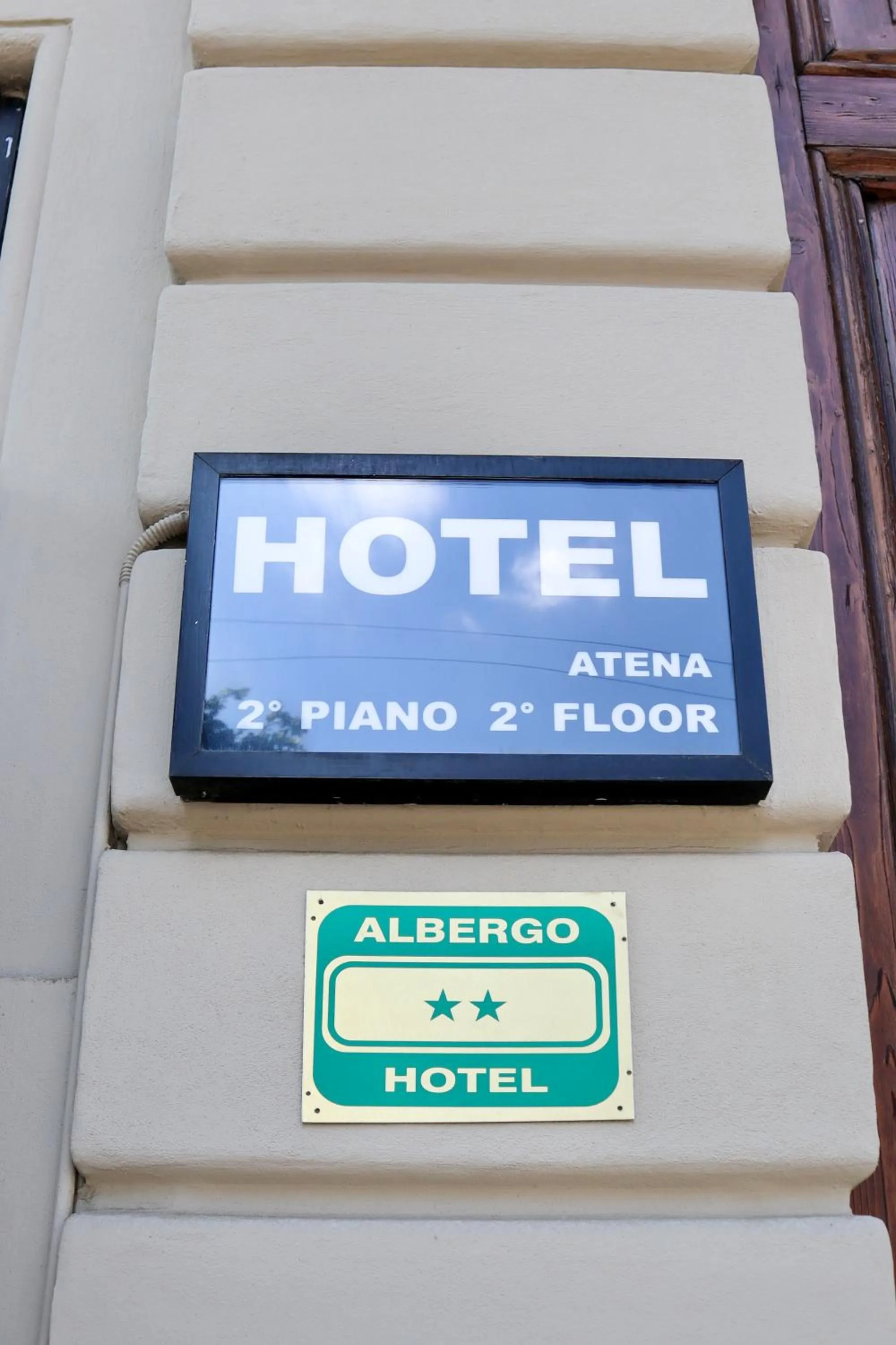 Property logo or sign in Hotel Atena