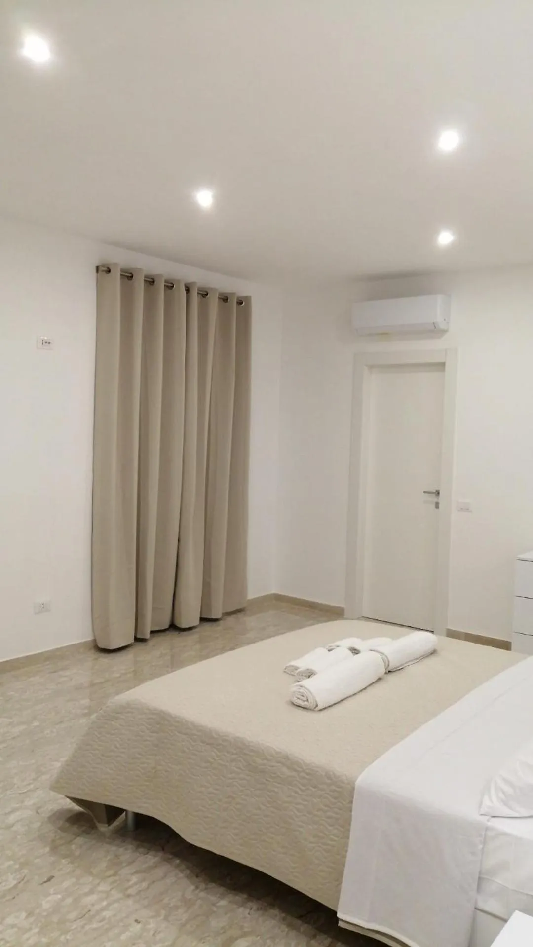 Bed in AMARE Bed & Breakfast