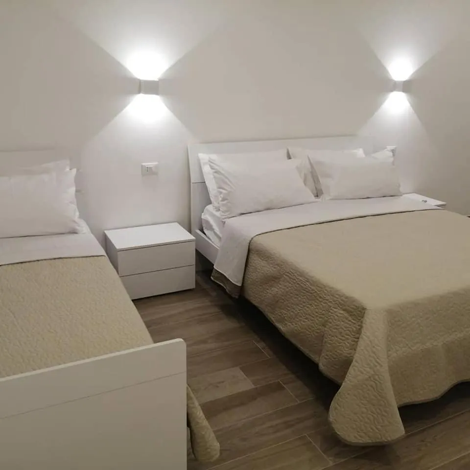 Bed in AMARE Bed & Breakfast