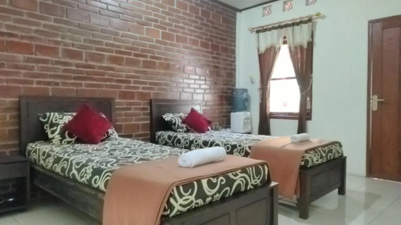Bed in Penginapan Homestay Mudiyono Syari'ah