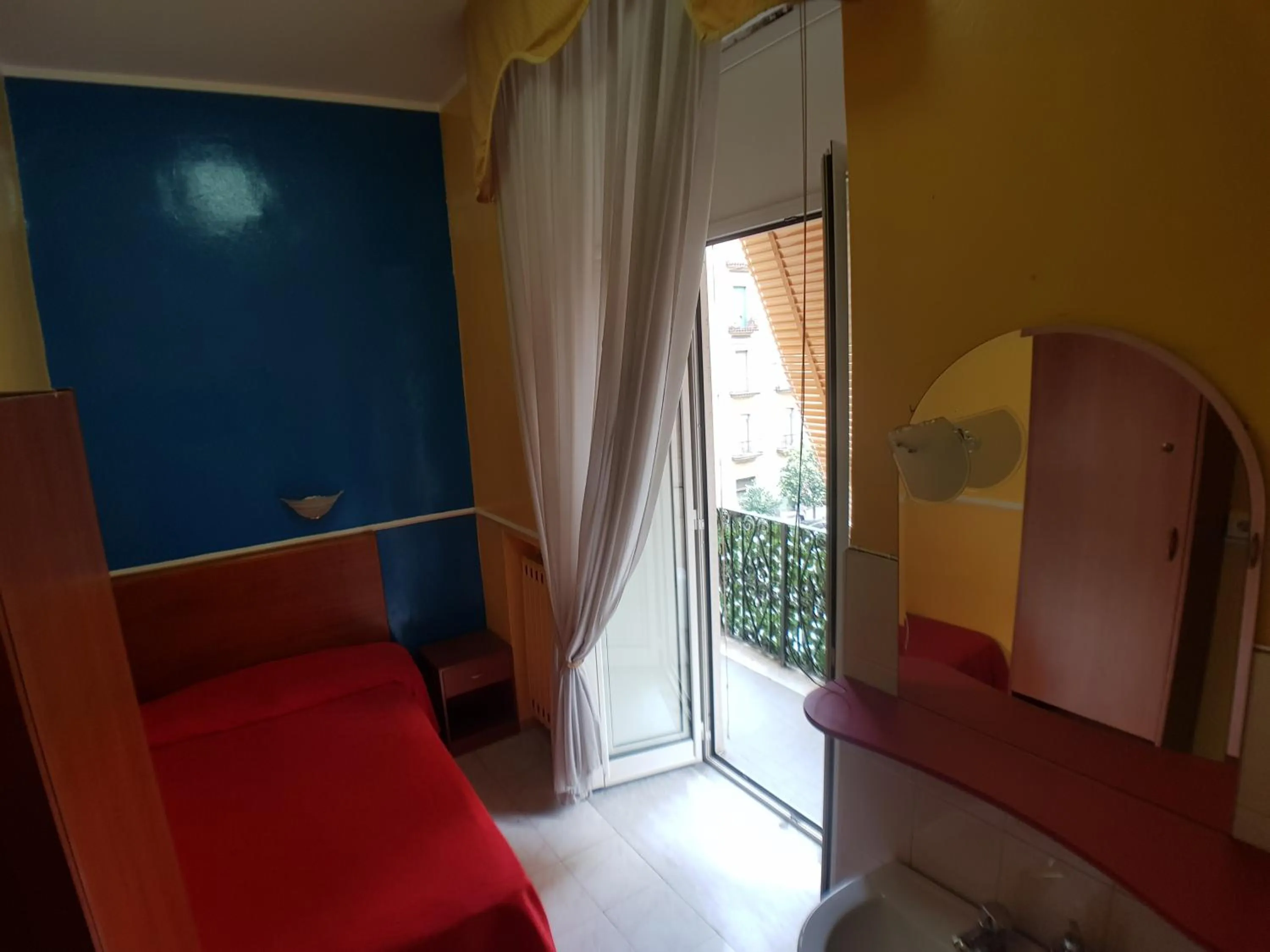 Bed in Hotel Ginevra