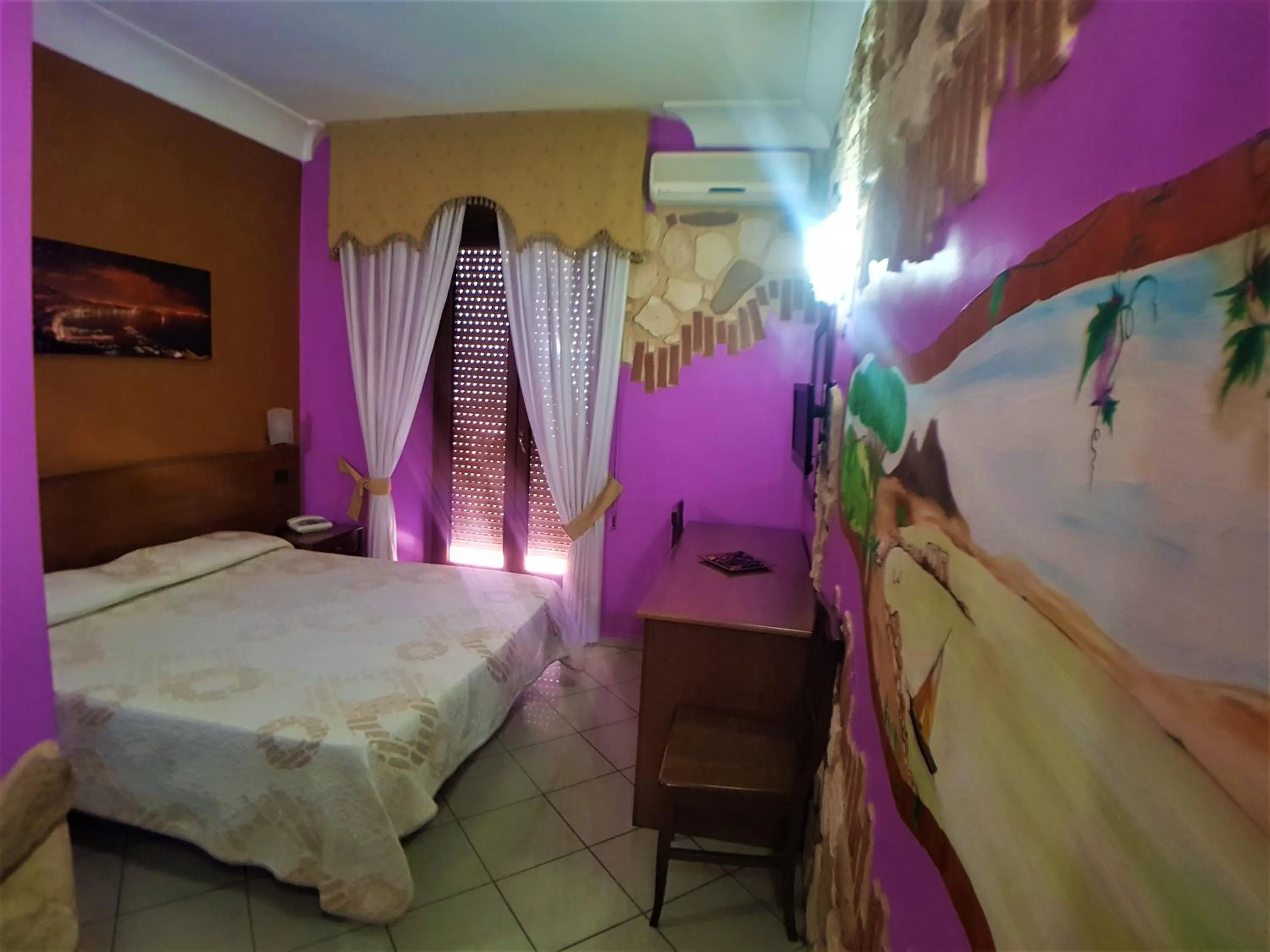 Bed in Hotel Ginevra