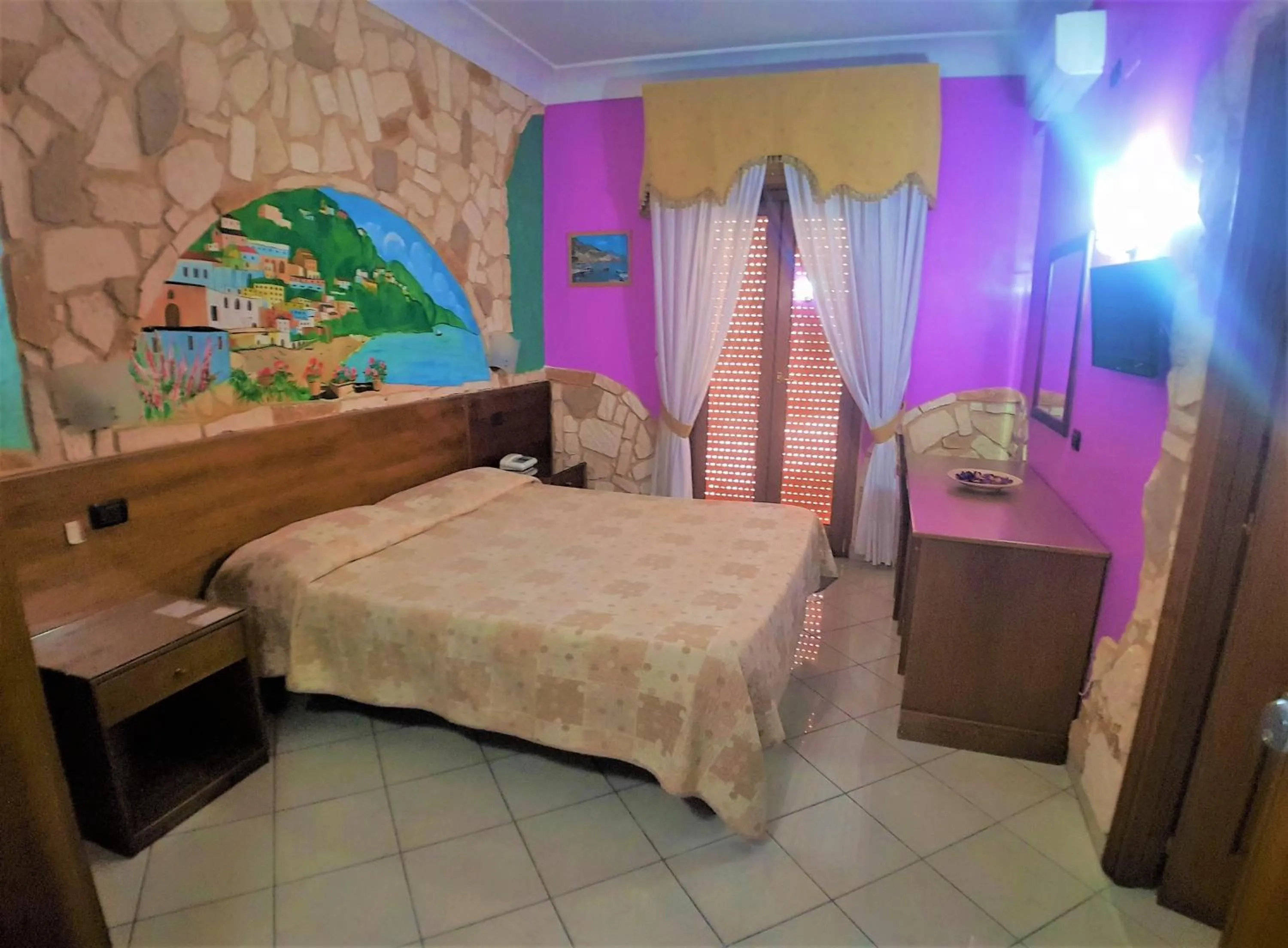 Bed in Hotel Ginevra