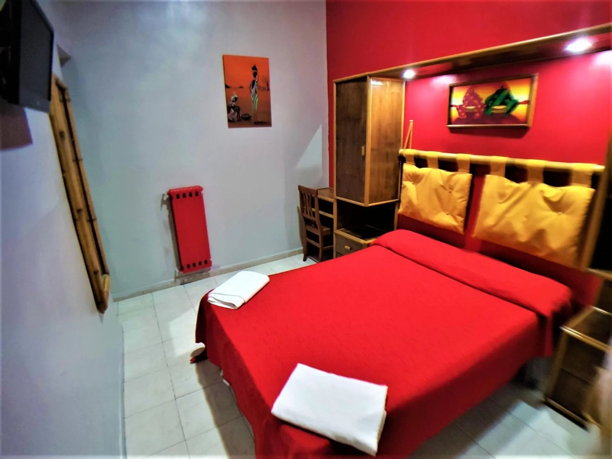 Bed in Hotel Ginevra