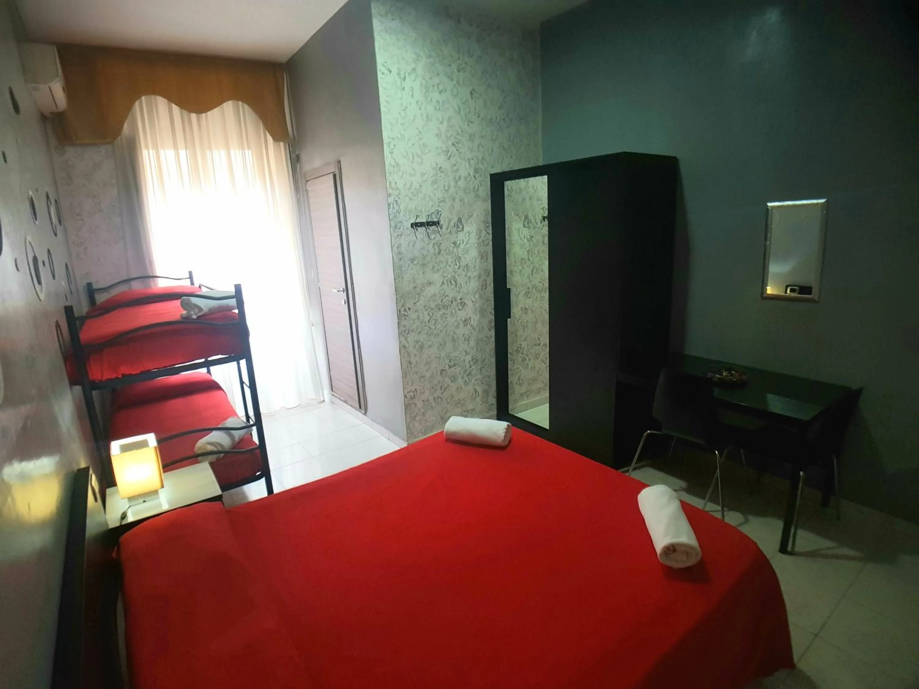 Bed in Hotel Ginevra